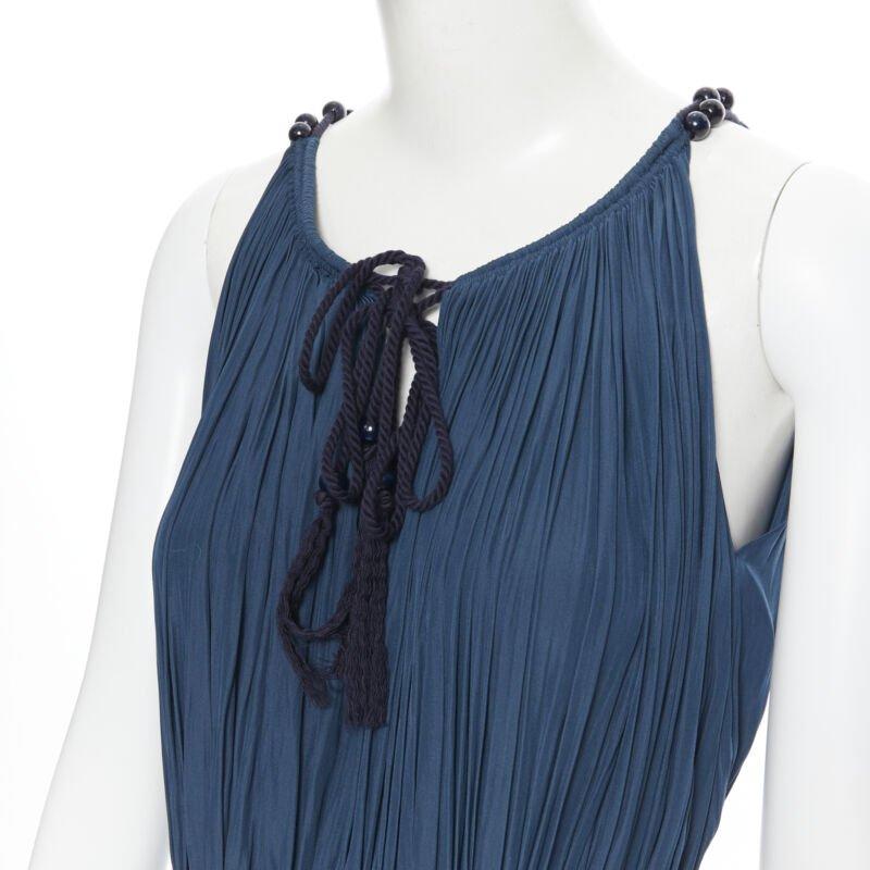 LANVIN 2016 teal blue pleated polyester beaded tie string slit maxi dress FR34
Reference: LNKO/A01702
Brand: Lanvin
Designer: Alber Elbaz
Collection: 2016
Material: Polyester
Color: Blue
Pattern: Solid
Closure: Drawstring
Extra Details: Robe tie