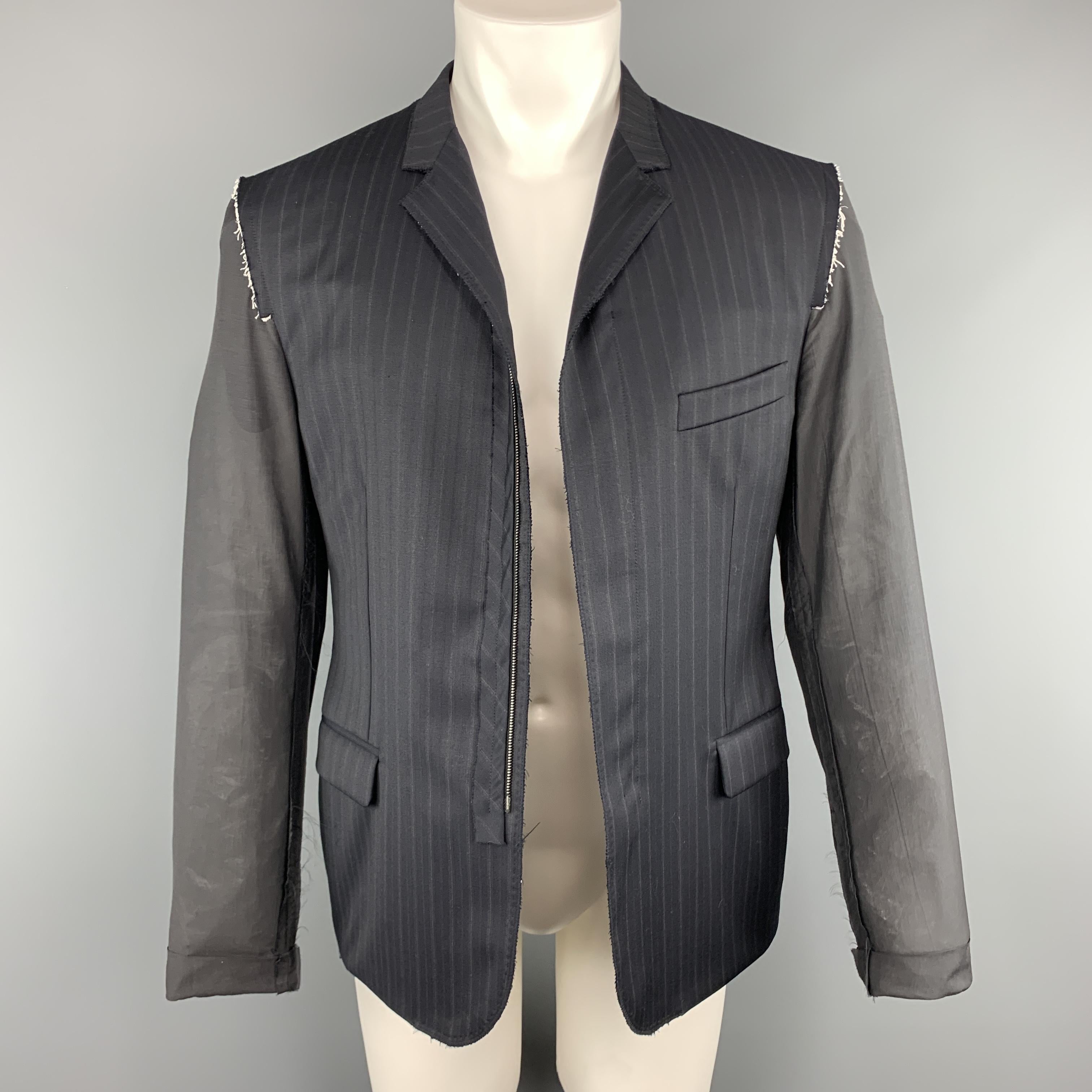 LANVIN sport coat features a navy striped front with notch lapel and hidden placket zip closure with sheer charcoal sleeves and back. Made in Italy.
 
Excellent Pre-Owned Condition.
Marked: IT 50
 
Measurements:
 
Shoulder: 18 in.
Chest: 42