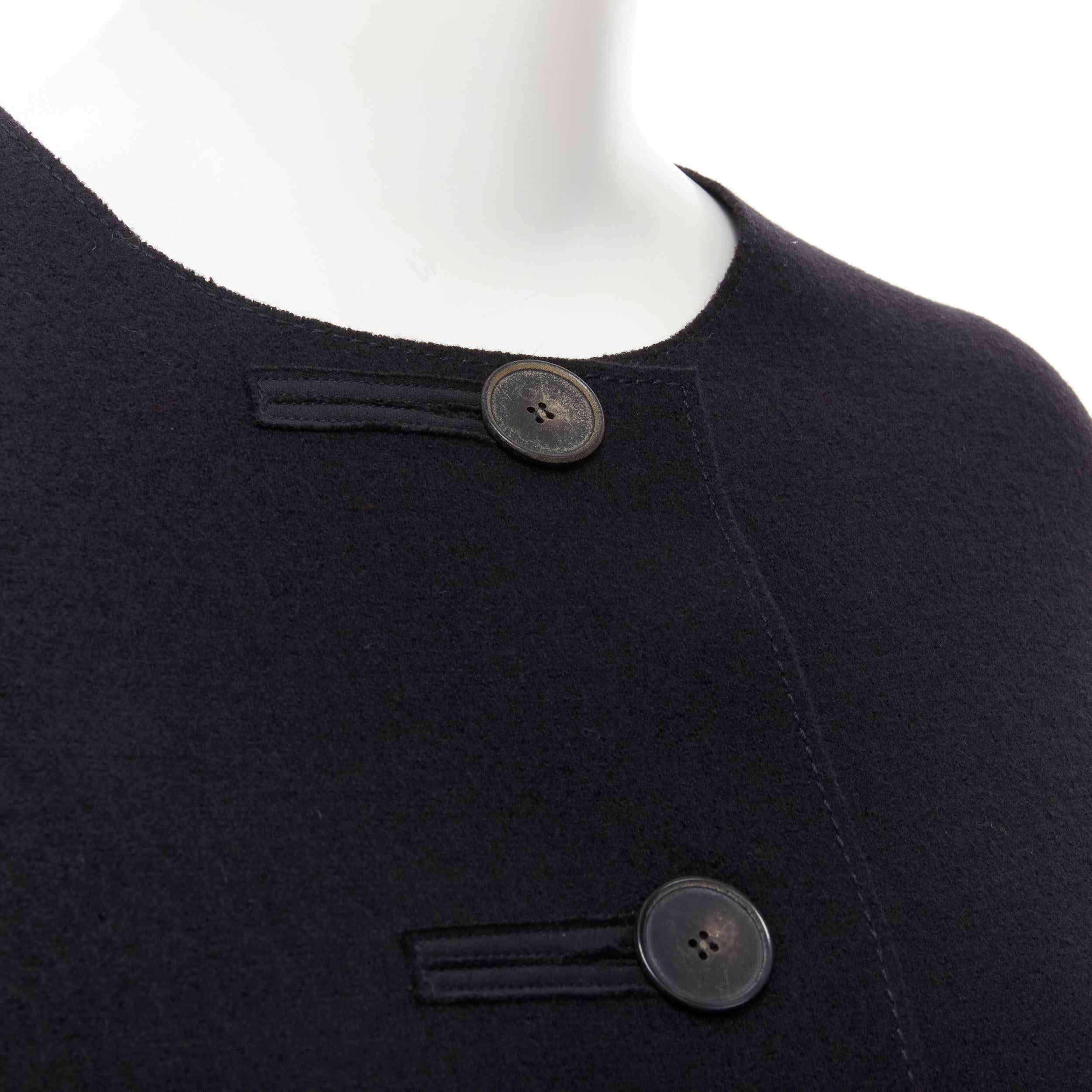 LANVIN Alber Elbaz 2004 black wool pinched darts button front fitted coat FR38 S 
Reference: CELG/A00158 
Brand: Lanvin 
Designer: Alber Elbaz 
Collection: Fall Winter 2004 
Material: Wool 
Color: Black 
Pattern: Solid 
Closure: Button 
Extra