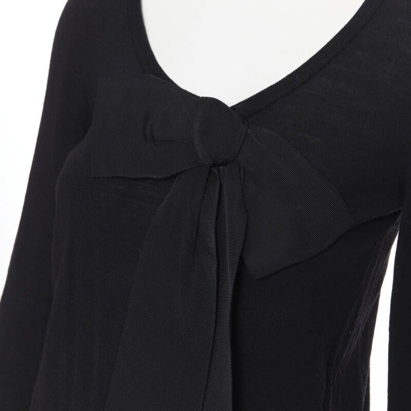 LANVIN ALBER ELBAZ 2008 pull en laine polaire noir signature ruban gros grain S
Référence : SNKO/A00044
Marque : Lanvin
Designer : Alber Elbaz
Modèle : Pull-over à nœuds
Collection : Automne-Hiver 2008
MATERIAL : Laine
Couleur : Noir
Motif :