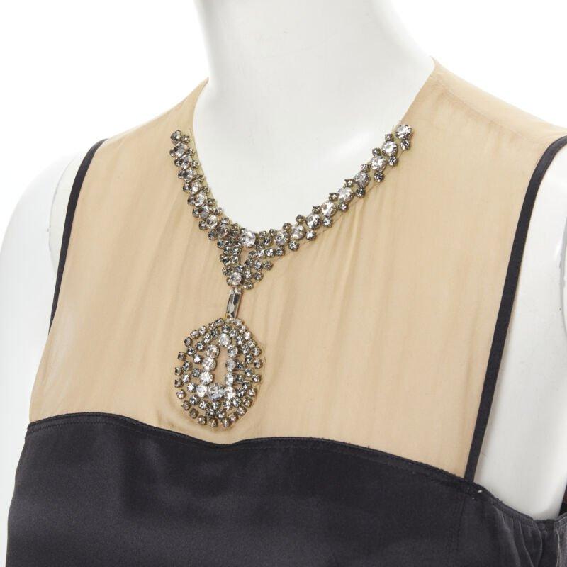 LANVIN Alber Elbaz 2013 nude illusion crystal necklace silk dress M
Reference: CAKK/A00017
Brand: Lanvin
Designer: Alber Elbaz
Model: Illusion necklace dress
Collection: 2013
Material: Silk
Color: Black, Nude
Pattern: Solid
Closure: Button
Extra