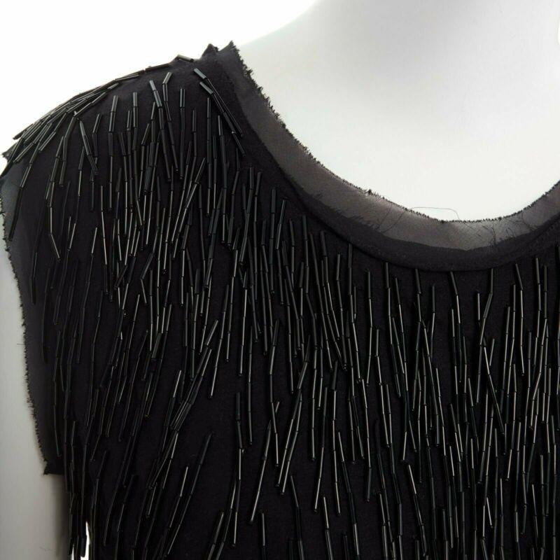 LANVIN ALBER ELBAZ black beaded fringe embellished flapper silk dress FR34 XS
Reference: TGAS/A00418
Brand: Lanvin
Designer: Alber Elbaz
Material: Cotton
Color: Black
Pattern: Solid
Closure: Zip
Extra Details: Cotton, Viscose, Verreglass embroidery.