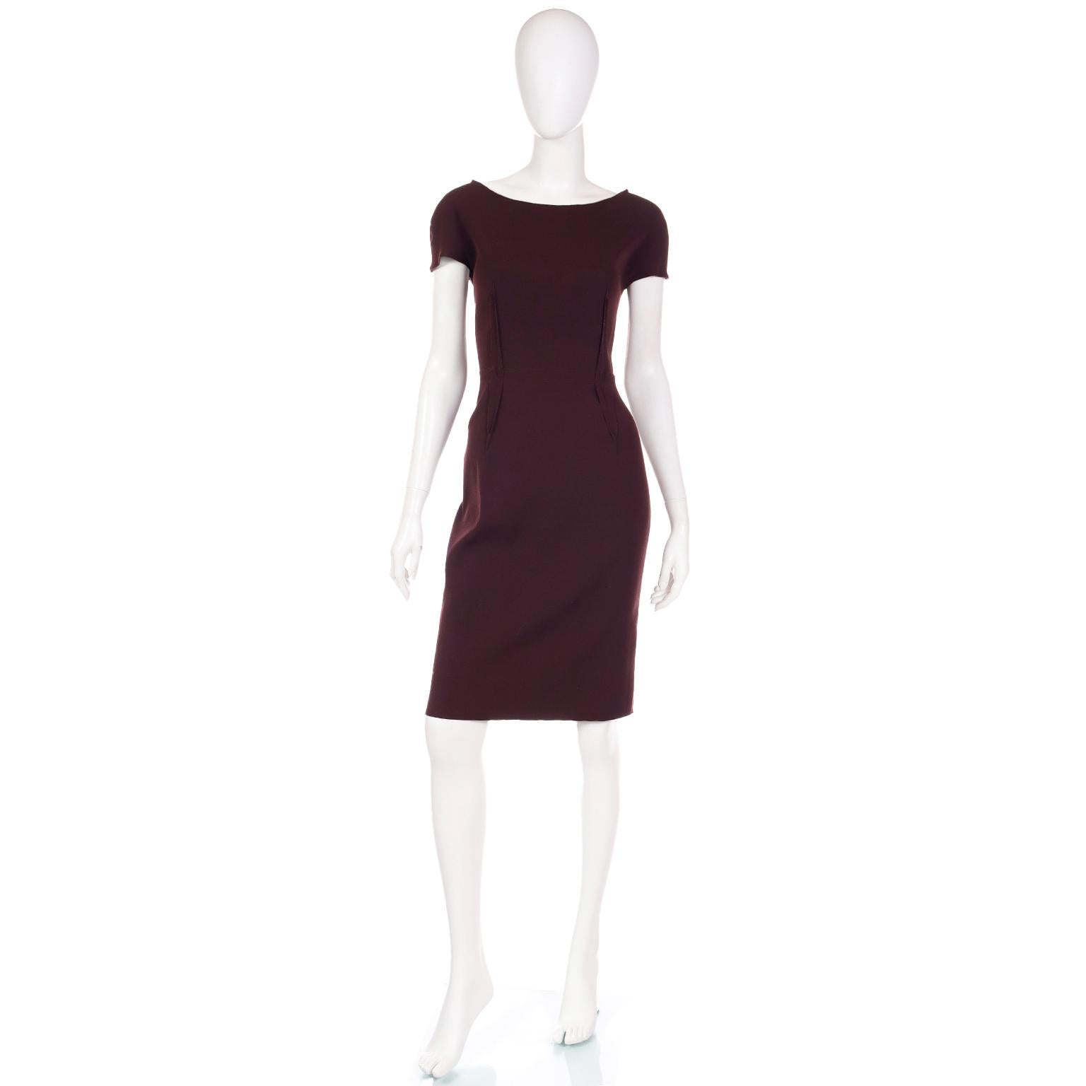 This lovely vintage Lanvin day dress was designed by Alber Elbaz for the Fall / Winter 2011 collection. We always love finding Alber Elbaz pieces and this deep plum dress features raw seams, which are a signature element of Elbaz pieces. 
Made in