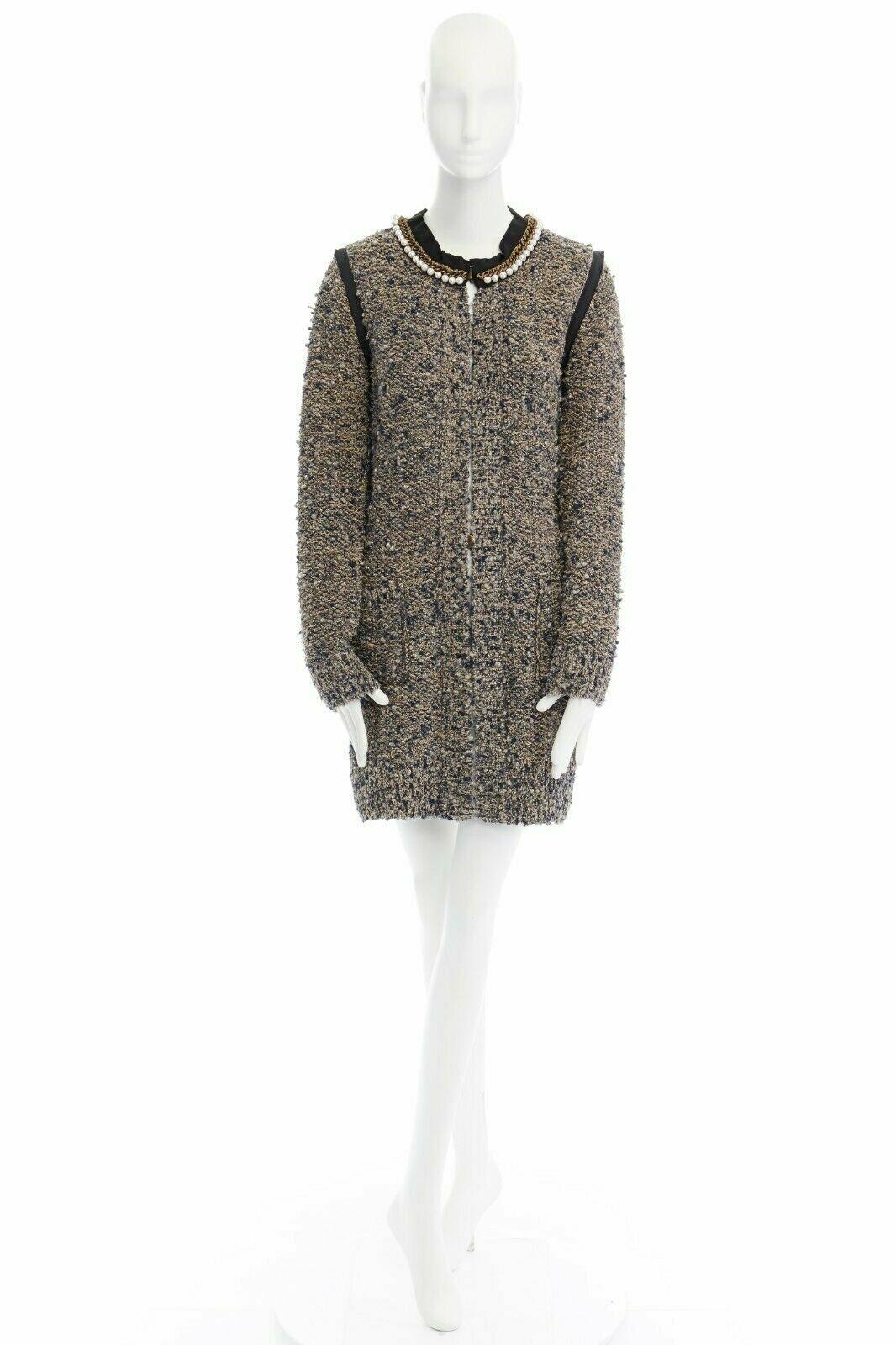 LANVIN ALBER ELBAZ metallic brown boucle pearl chain collar cardigan coat M FR38 
Reference: TGAS/A00490 
Brand: Lanvin 
Designer: Alber Elbaz 
Material: Wool 
Color: Grey 
Pattern: Other 
Extra Detail: From the 10th Anniversary Collection. Taupe