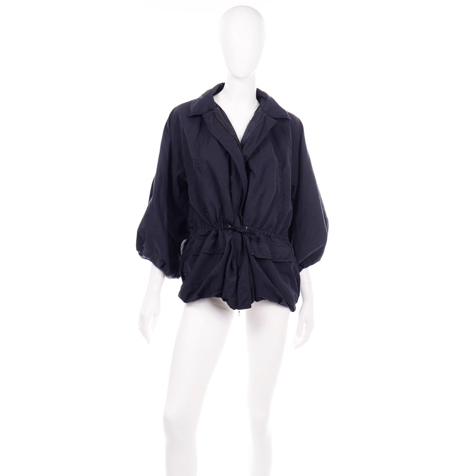 We are in love with this Lanvin Spring Summer 2010 Midnight blue jacket! The jacket was designed by Alber Elbaz and is a great example of his incredible talent. The jacket has a fabulous bubble hem, a front zipper, drawstring, voluminous statement