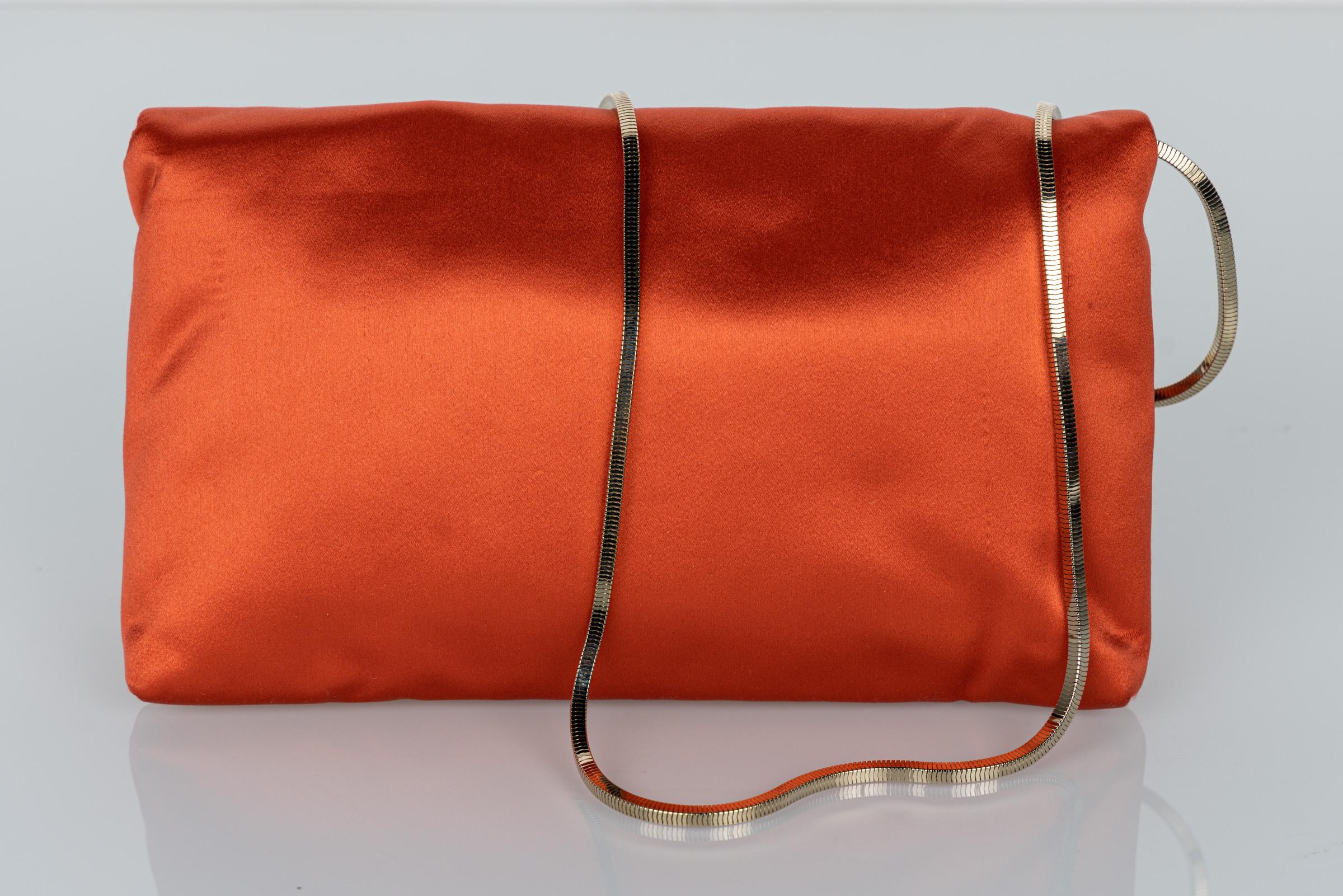 orange satin clutch bag