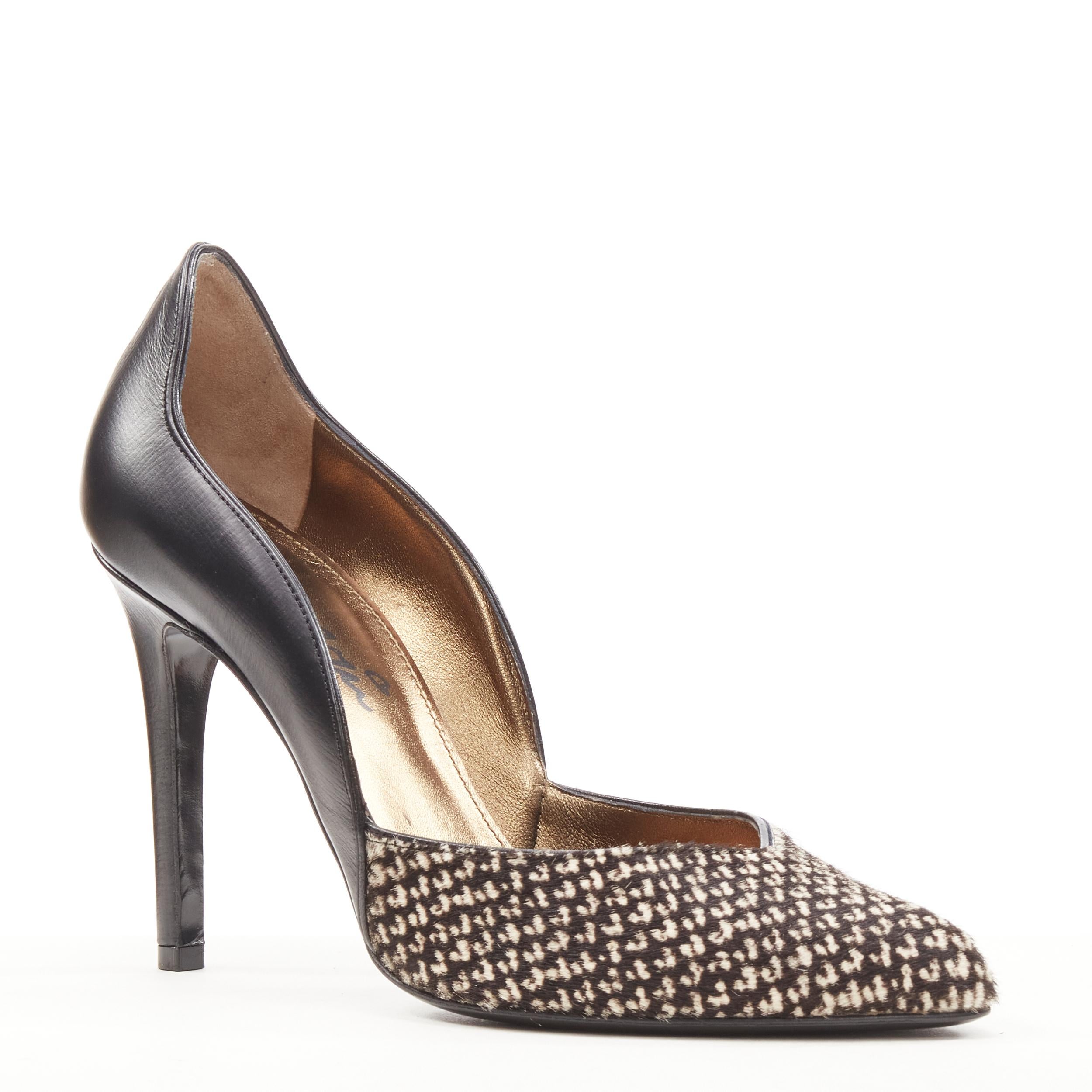 LANVIN Alber Elbaz Vintage printed calf hair scalloped top line pump EU37 
Reference: SNKO/A00191 
Brand: Lanvin 
Designer: Alber Elbaz 
Material: Leather 
Color: Black 
Pattern: Solid 
Made in: Italy 

CONDITION: 
Condition: Excellent, this item