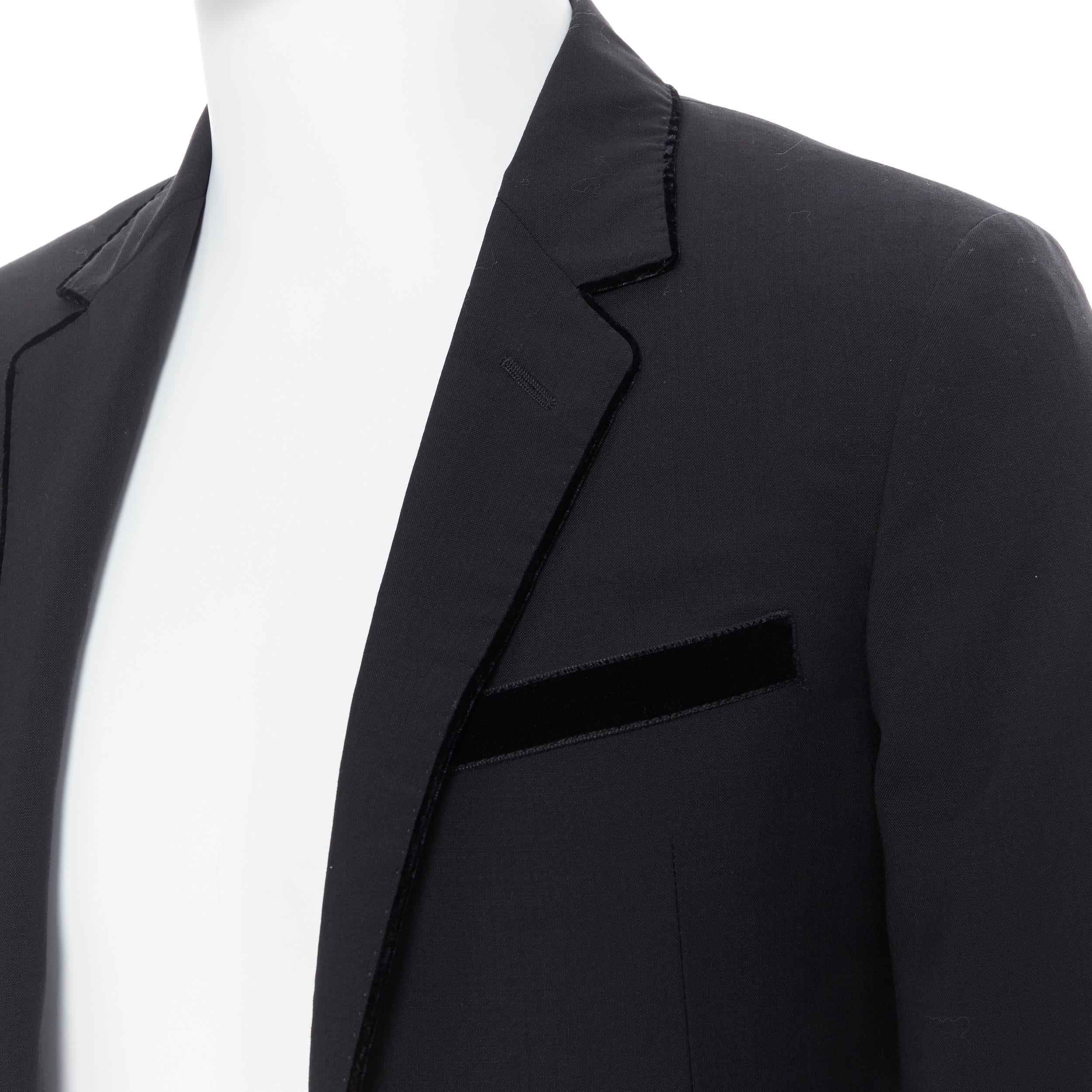 LANVIN ALBER ELBAZ wool blend black velvet peak lapel formal blazer jacket FR44
Brand: Lanvin
Designer: Alber Elbaz
Model Name / Style: Blazer 
Material: Wool blend
Color: Black
Pattern: Solid
Closure: Button
Extra Detail: Velvet trimming along