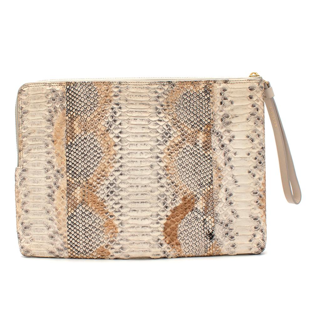 Lanvin Beige Python Skin Pouch

-Super soft snake skin
-Classic shape in a neutral shade 
-Golden toned hardware 
-Zip to the top with leather wrist strap 
-Branding to the wrist strap 
-Fully textile lined 

Materials:
Snake skin 
 
Made in Spain