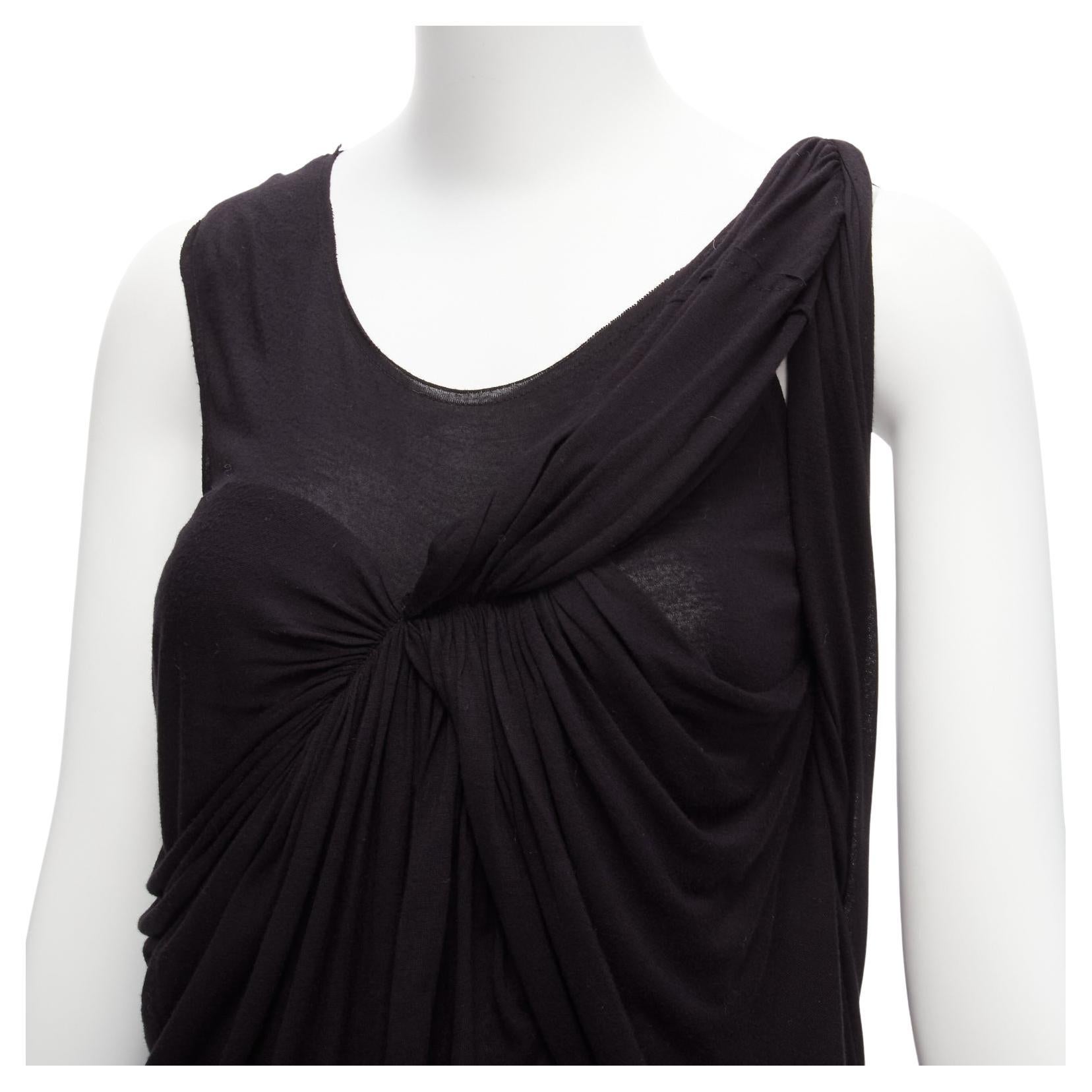 LANVIN black asymmetric draped bust scoop neck sleeveless tank top FR32 XXS
Reference: SNKO/A00230
Brand: Lanvin
Designer: Alber Elbaz
Material: Viscose
Color: Black
Pattern: Solid
Closure: Pullover
Extra Details: Plain back design.
Made in: