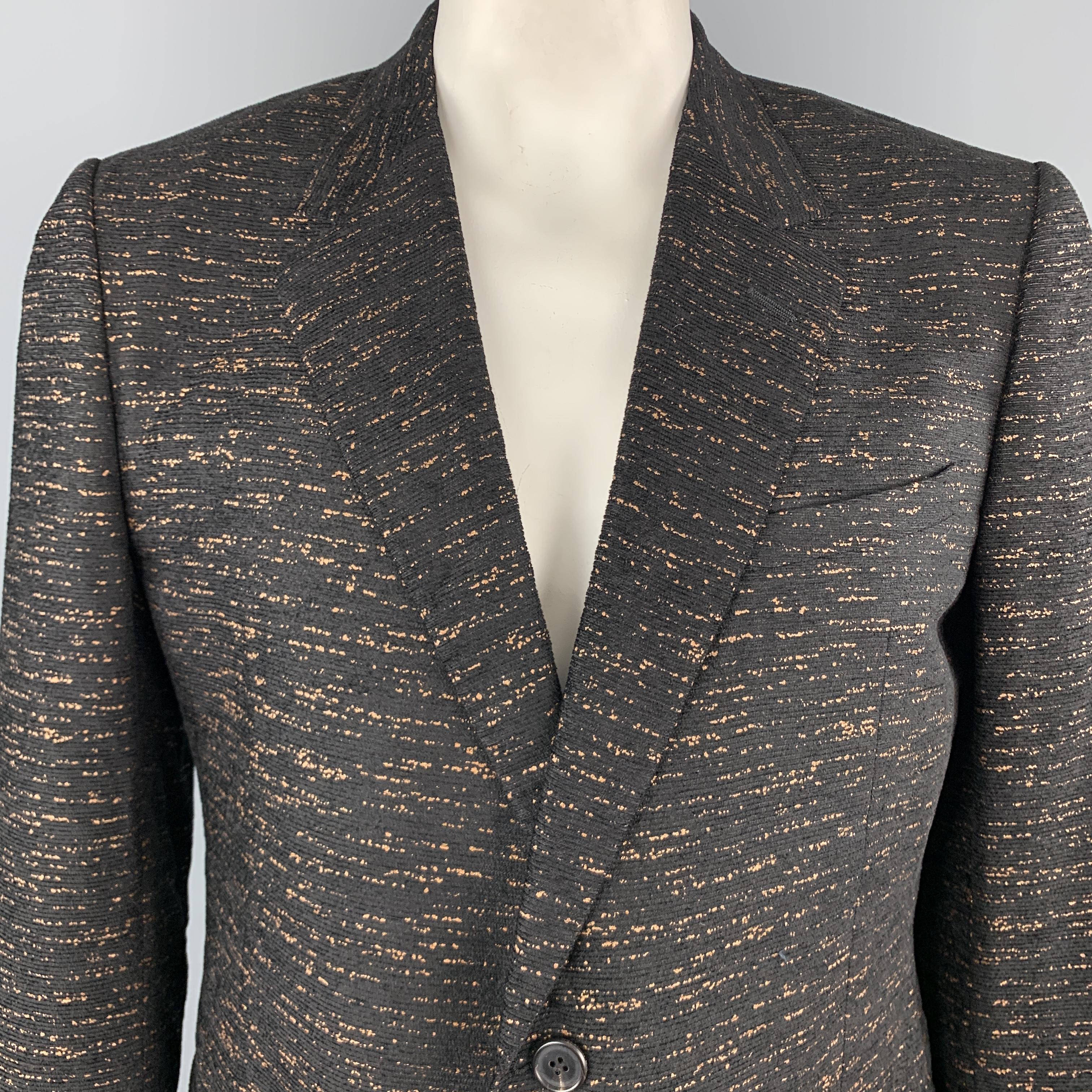 LANVIN sport coat comes in a unique ribbed textured black fabric with an all over copper orange heathered effect, notch lapel, and single breasted two button front. Made in Italy.

New with Tags.
Marked: IT 56

Measurements:

Shoulder: 18.5
