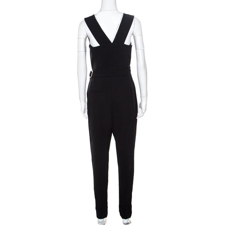 Lanvin sleeveless jumpsuit exudes an understated, yet stylish approach to evening dressing. Flaunting a draped bodice, the jumpsuit features a wrap waistline and tapered legs. Team this with chic accessories and pointed pumps.

Includes: The Luxury