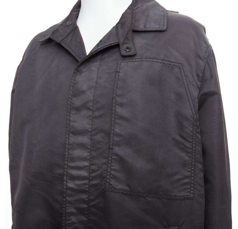 LANVIN Schwarze schwarze distressed nylon-Schwarze Knöpfe mit Kordelzug anorak IT50 L
Referenz: PRWU/A00039
Marke: Lanvin
Designer: Alber Elbaz
MATERIAL: Nylon
Farbe: Schwarz
Muster: Solide
Verschluss: Knopf
Zusätzliche Details: Versteckte