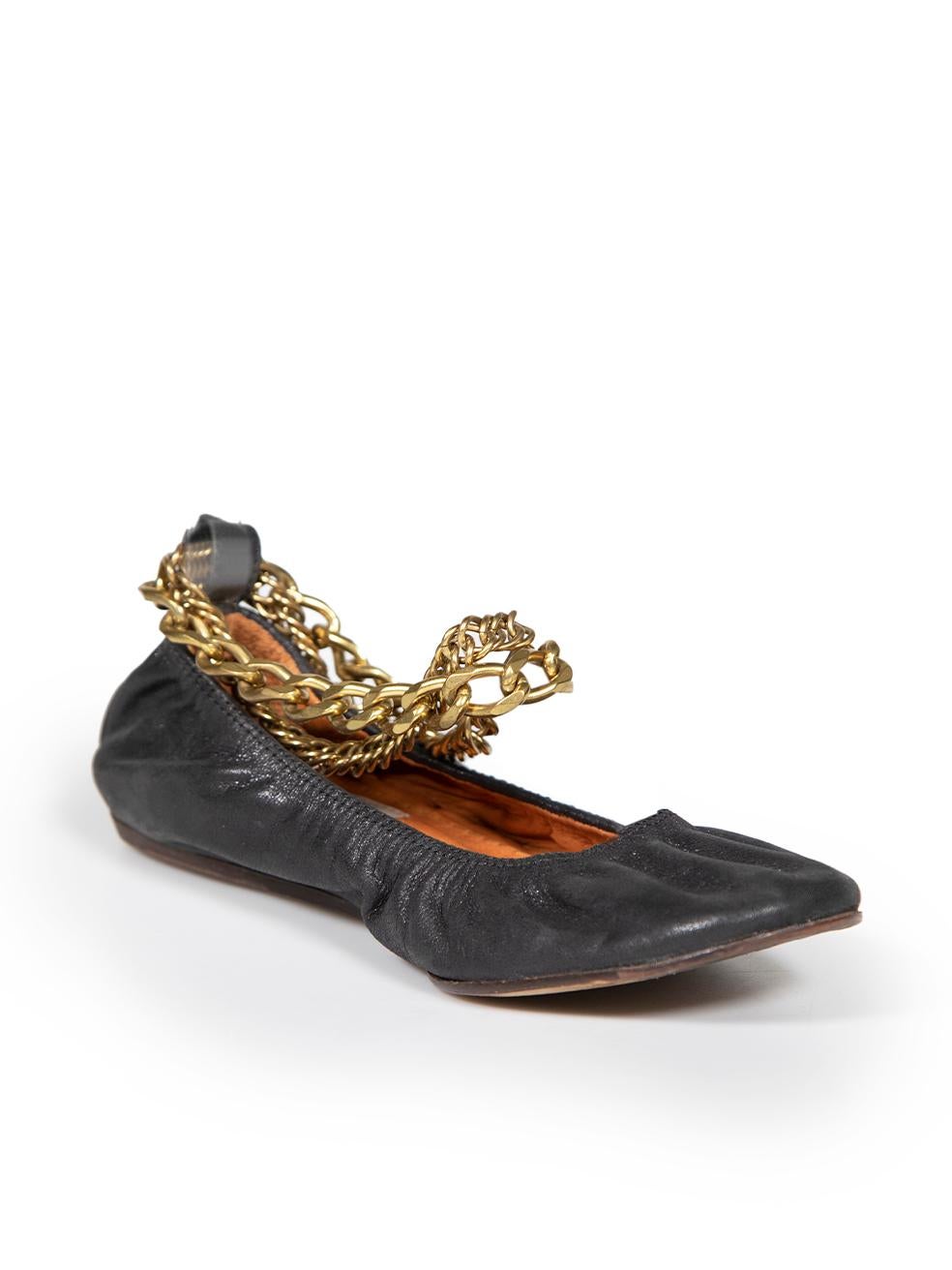 CONDITION is Good. General wear to shoes is evident. Moderate signs of wear to both shoes with cracking of the soles on this used Lanvin designer resale item.
 
 
 
 Details
 
 
 Black
 
 Leather
 
 Ballet flats
 
 Round toe
 
 Flat heel
 
 Gold