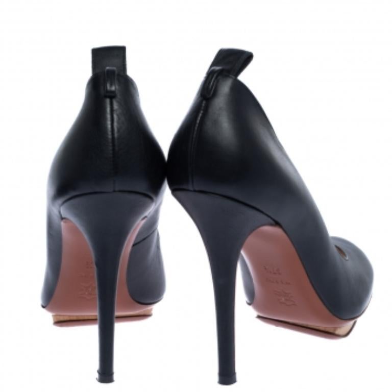 You are sure to love these amazing pumps from Lanvin as they're well-built and utterly gorgeous! They've been crafted from black leather and designed with round toes, pull tabs on the counters, platforms, stiletto heels, and comfortable insoles.