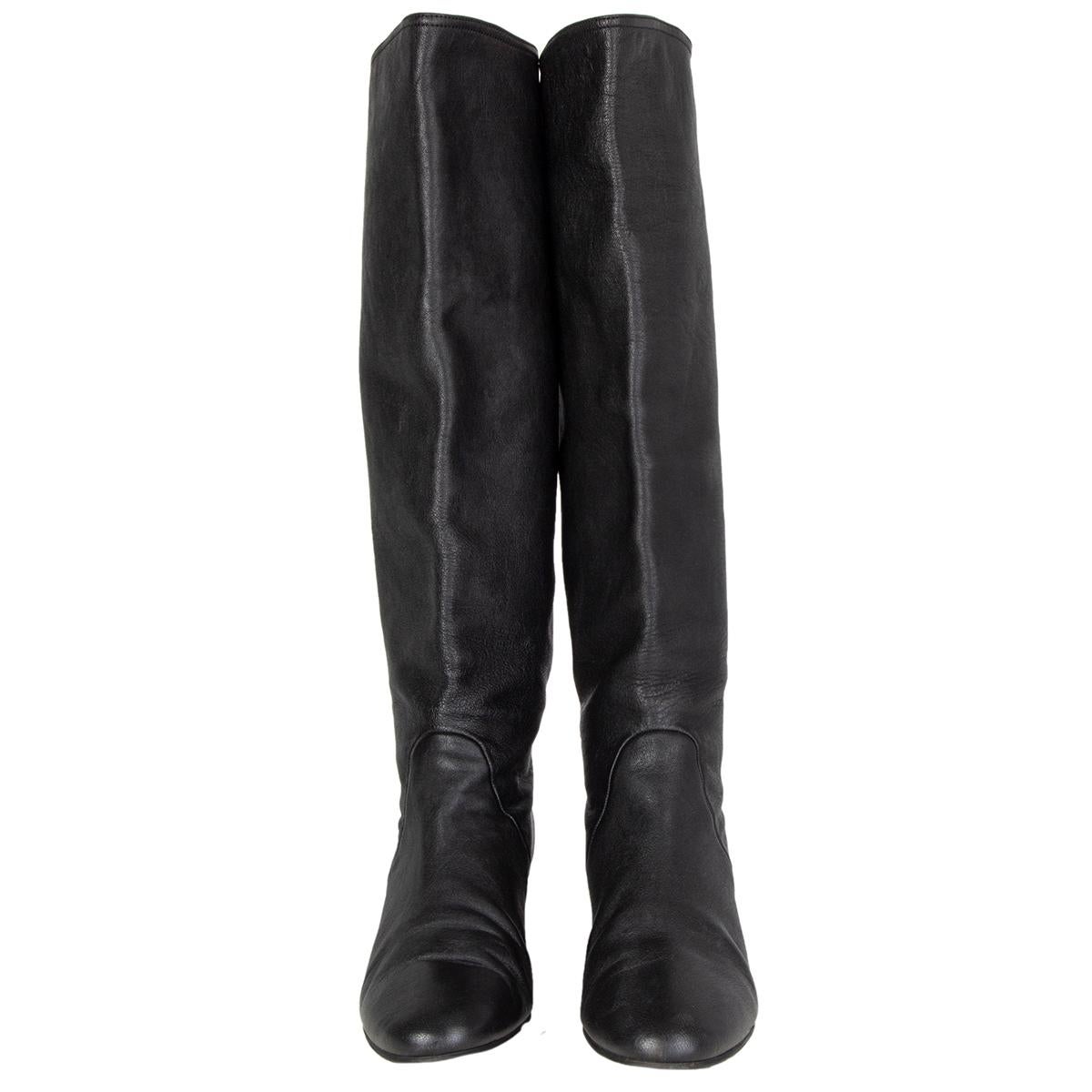 100% authentic Lanvin knee-high round-toe boots in black lambskin with hidden wedge heel. Have been worn and are in excellent condition. Rubber sole has been added. 

Measurements
Imprinted Size	39.5
Shoe Size	39.5
Inside Sole	26.5cm