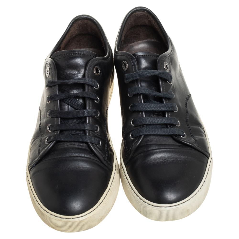 Crafted from leather, these sneakers feature simple tie-ups and come equipped with comfortable leather-lined insoles and white rubber soles. These sneakers by Lanvin are sure to charm all.

