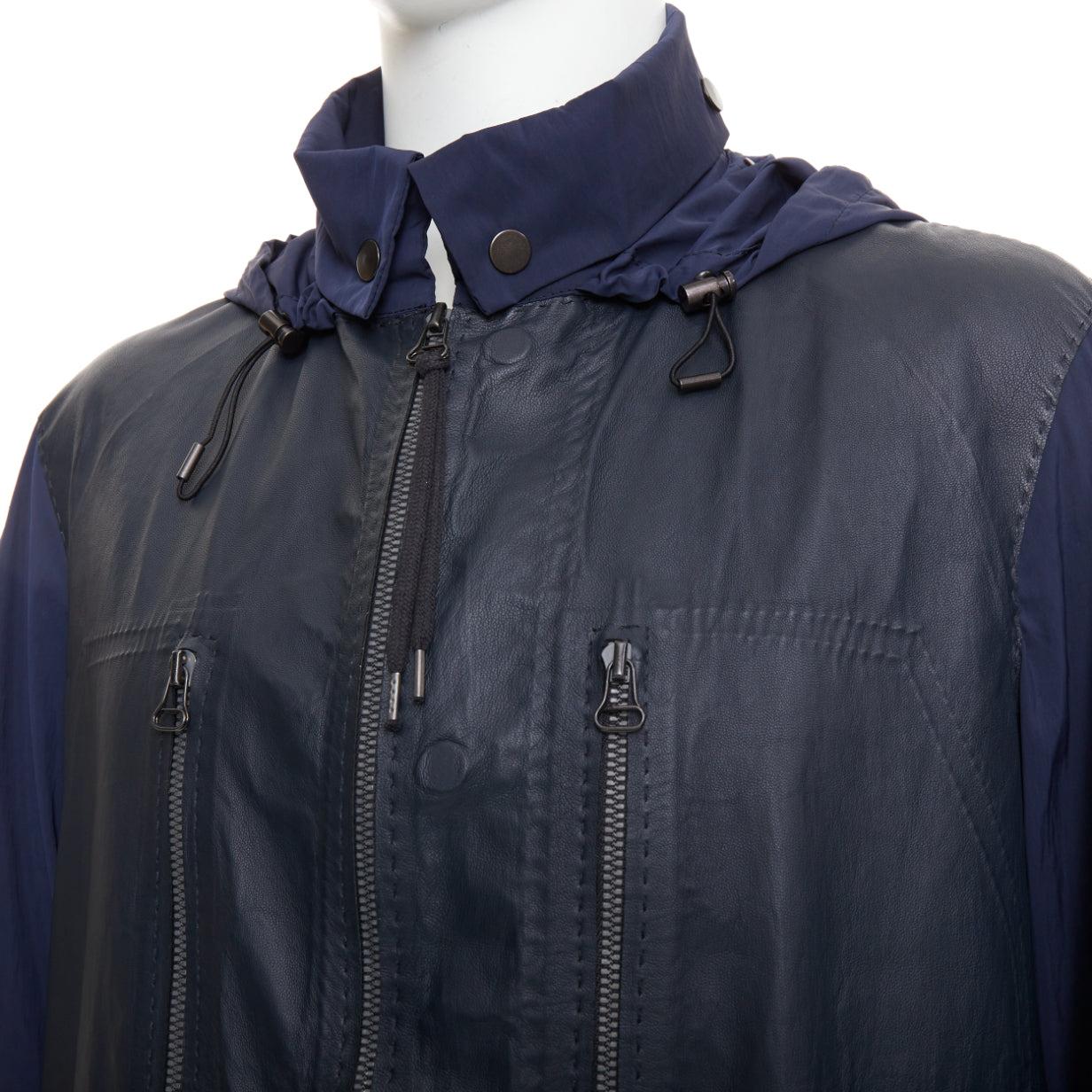 LANVIN manteau anorak en nylon léger marine avec empiècements en cuir noir FR48 M
Référence : PRWU/A00190
Marque : Lanvin
Designer : Alber Elbaz
MATERIAL : Nylon, cuir
Couleur : Marine, Noir
Motif : Solide
Fermeture : boutons-pression
Doublure :