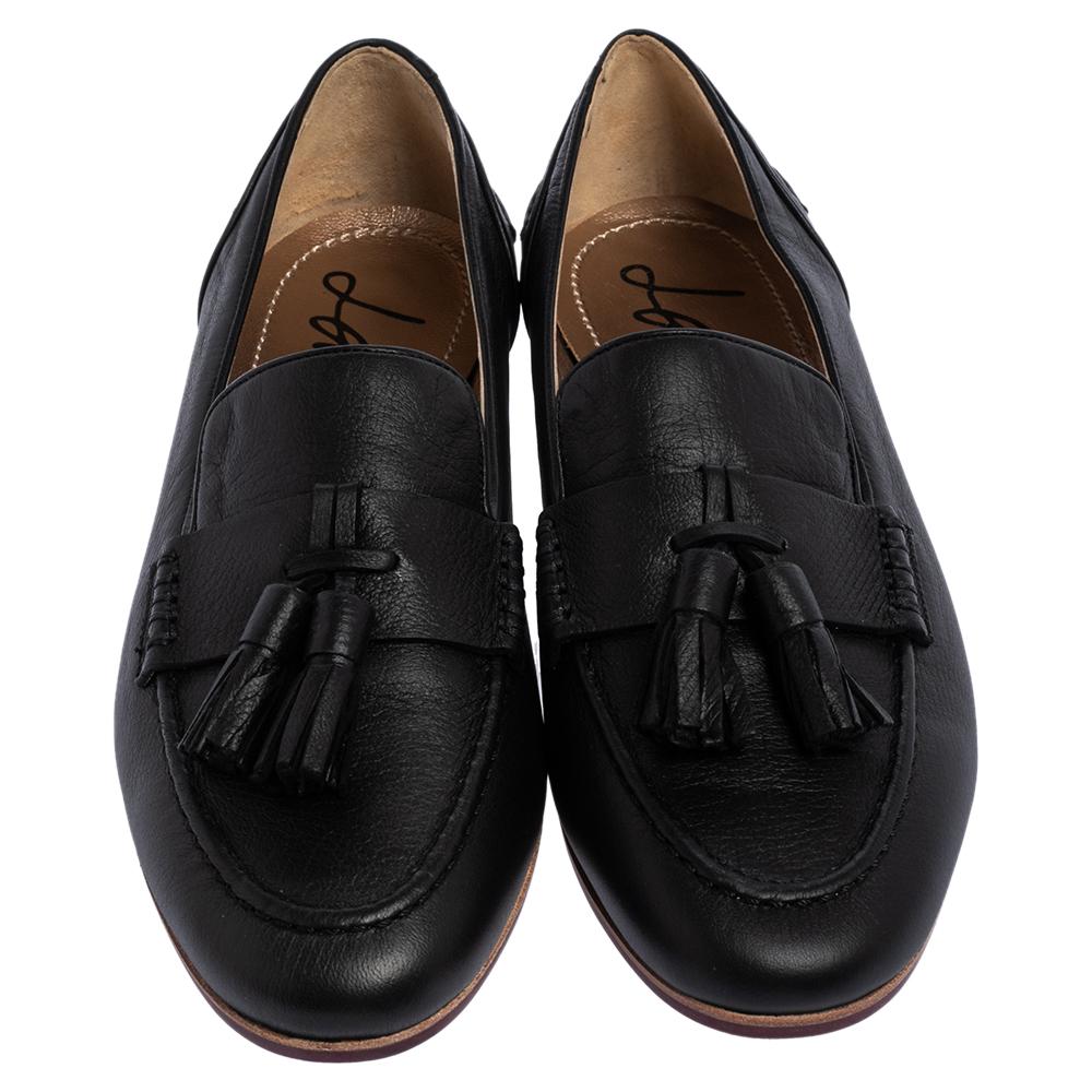 These comfortable women's loafers by Lanvin will make a fine addition to your shoe collection. They have been crafted from black leather and styled with tassels on the uppers. Leather insoles and low heels complete the pair.

Includes: Original