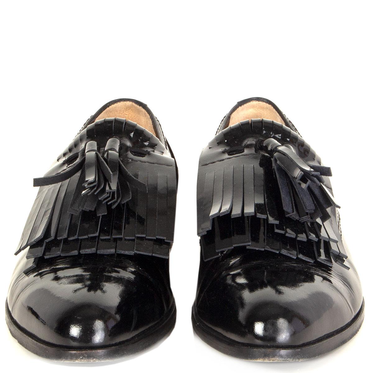 100% authentic  Lanvin 'Boyish' tassel loafers in black patent leather. Have been worn with some visible creased parts at the front. Overall in good condition.  

Measurements
Imprinted Size	38
Shoe Size	38
Inside Sole	25cm (9.8in)
Width	7.5cm
