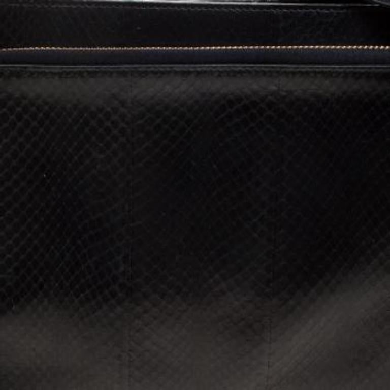 Featuring a minimal yet chic construct, this Lanvin shoulder bag is an elegant way to carry your essentials. It features a boxy silhouette with a python leather body and comes fitted with an exterior zipper pocket. It features a zipper main