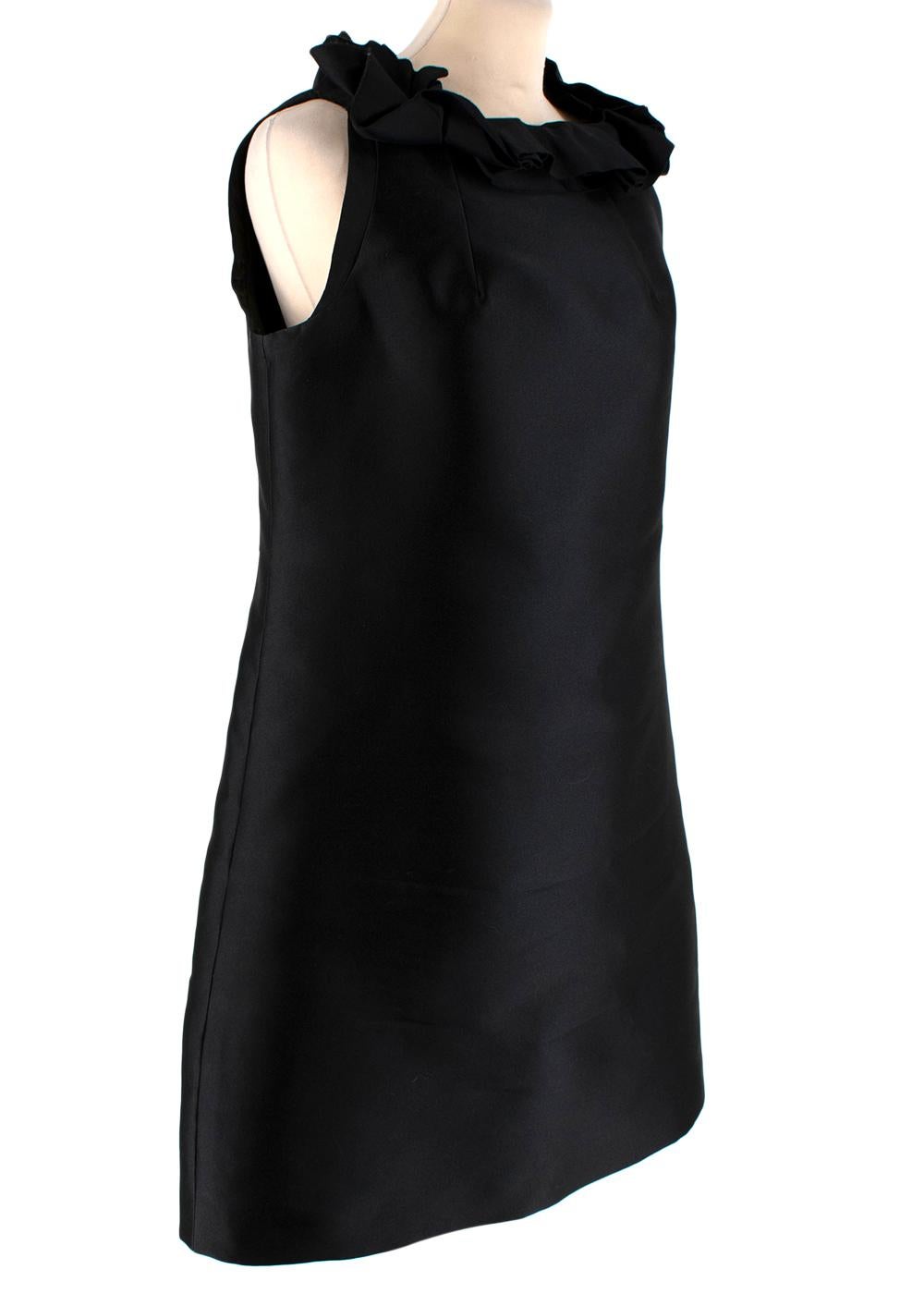 Lanvin Black Ruffled Cocktail Dress

- Ruffled by the crew neckline 
- Concealed zip closure at the back
- Fully lined with silk 
- Fitted cut
- Small repair to the lining, unnoticeable when worn

Materials:
70% Polyester
30% Polyamide
Lining - 100%