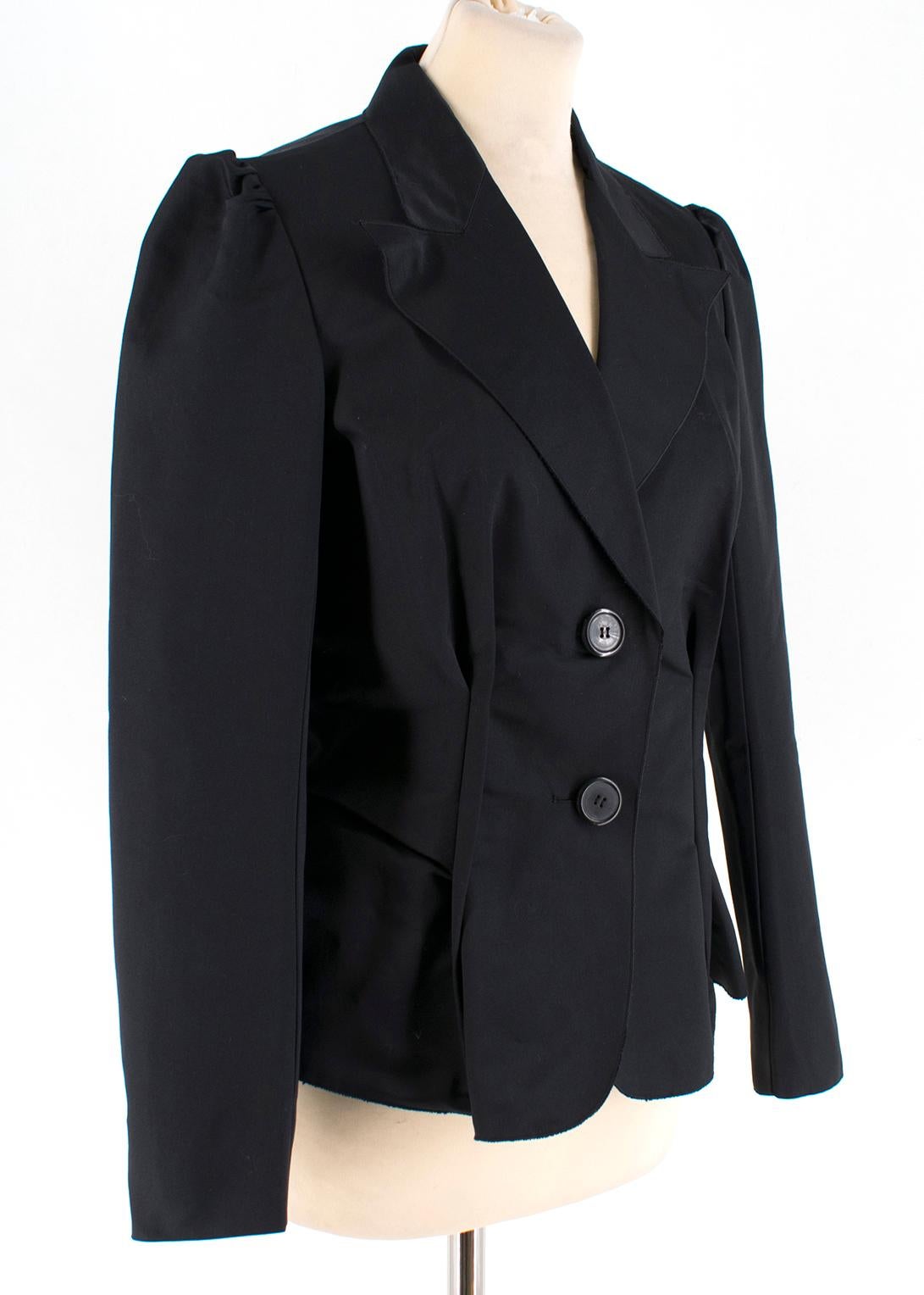 Lanvin Black Silk Blend Fitted Blazer

single breasted two button peak lapel;
lining 100% silk;
structured silhouette;
Made in France

Please note, these items are pre-owned and may show signs of
being stored even when unworn and unused. This is