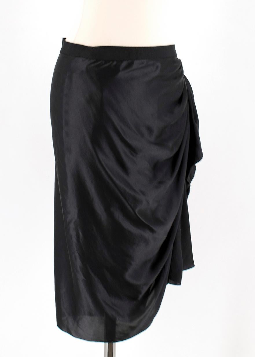 Lanvin Black Silk Pencil Skirt

- black silk skirt 
- Highwasited 
- wrap style 
- hooks closure

Please note, these items are pre-owned and may show some signs of storage, even when unworn and unused. This is reflected within the significantly