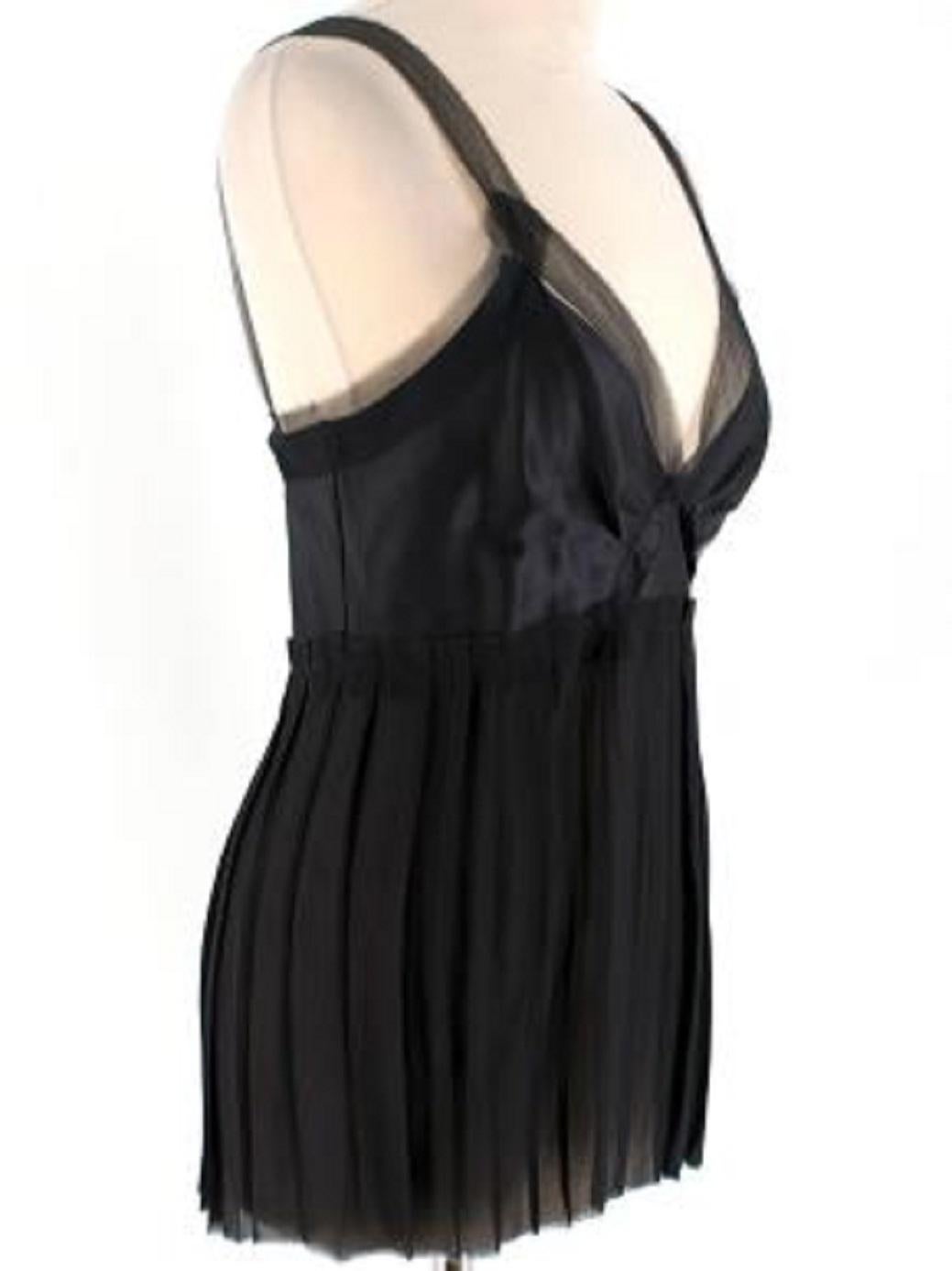 Lanvin Black Silk Pleated Top

-Sweetheart neckline 
-Pleated pantel 
-Raw edges 
-Zip fastening along the side 
-Sheer shoulder straps 

Material: 

100% Silk 

9.5/10 excellent conditions, please refer to images for further details. 

PLEASE NOTE,