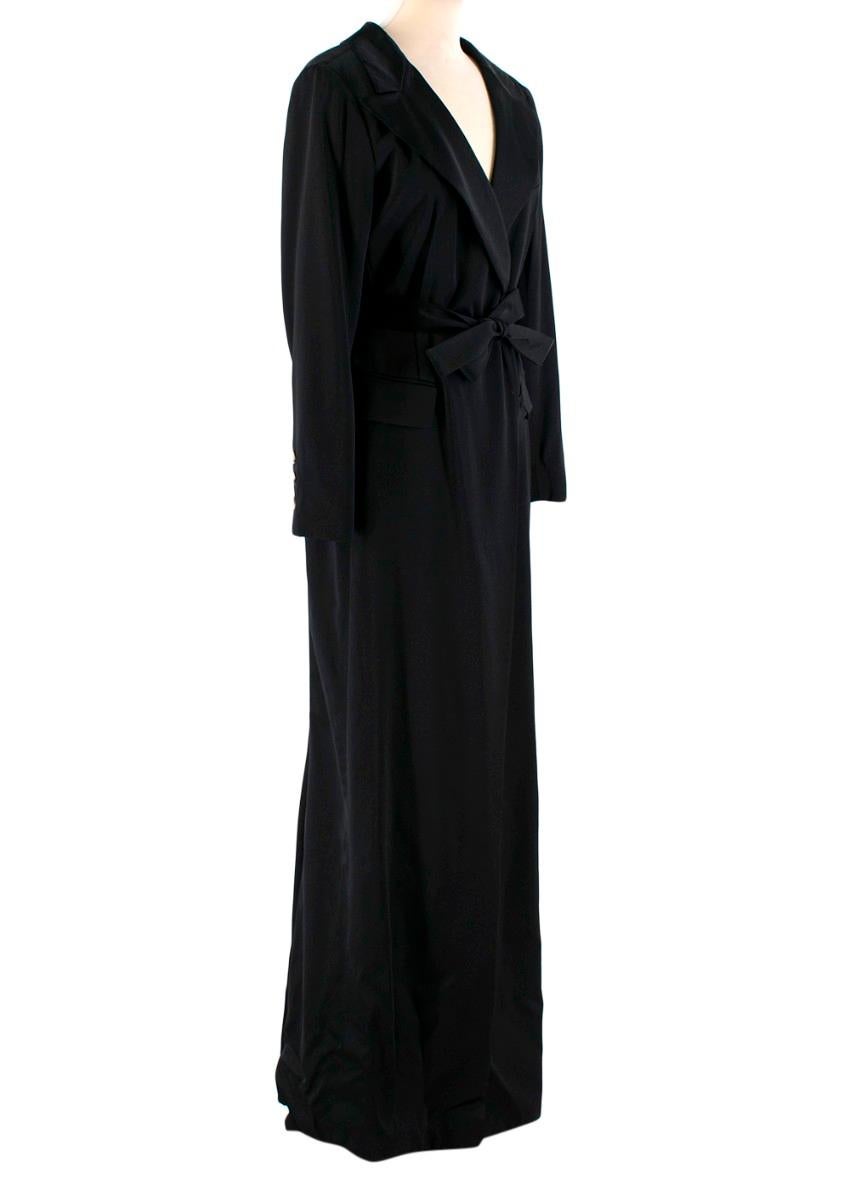 Lanvin Black Silk Wrap Gown

Floor length
Lined
Fitted
Non functional pockets
Longer at the back
wrap style with button closure
Made in France

Please note, these items are pre-owned and may show signs of being stored even when unworn and unused.