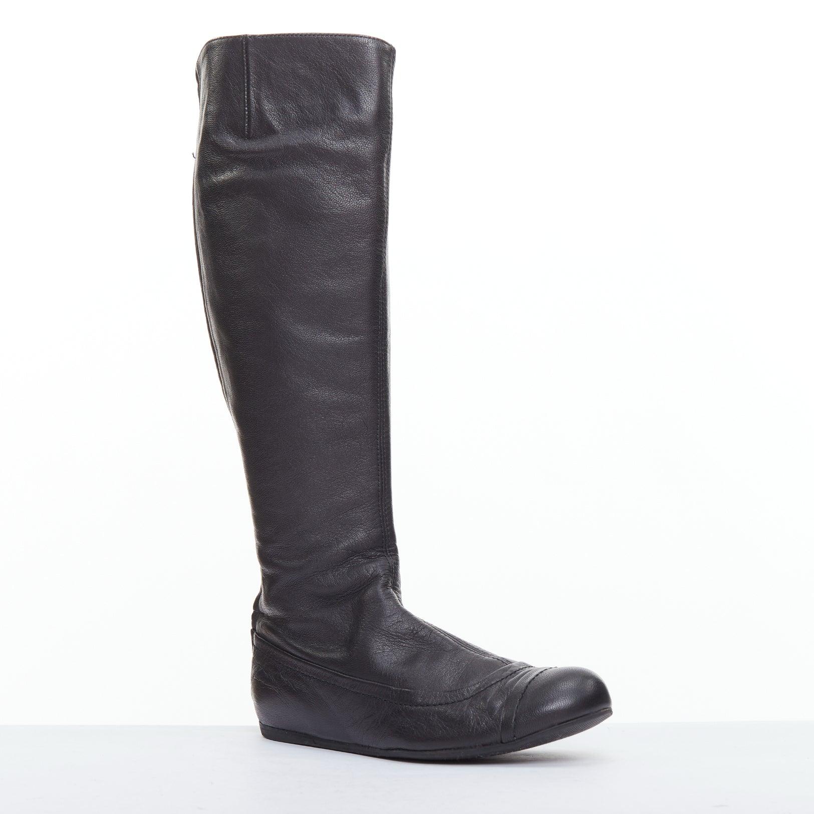 LANVIN black soft leather round toe panelled flat long boots
Reference: LNKO/A02367
Brand: Lanvin
Designer: Alber Elbaz
Material: Leather
Color: Black
Pattern: Solid
Closure: Zip
Lining: Brown Leather
Extra Details: Back zip.

CONDITION:
Condition: