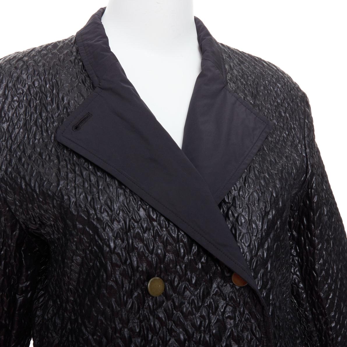 LANVIN black textured fabric double breasted cropped jacket FR42 XL
Reference: PRWU/A00075
Brand: Lanvin
Designer: Alber Elbaz
Material: Acetate
Color: Black
Pattern: Solid
Closure: Button
Lining: Black Fabric
Extra Details: Contrast fabric