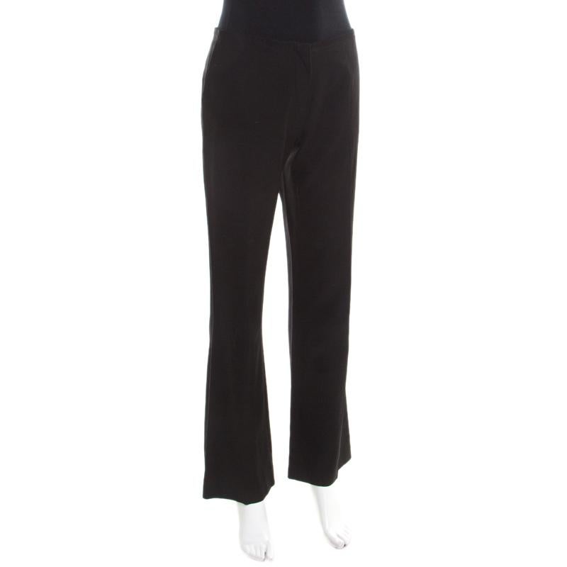 Every woman needs a good pair of trousers and what better than this fabulous pair from Lanvin. These black trousers feature a straight fit silhouette. They come equipped with a front zip fastening and three pockets. Pair them with a crisp shirt and