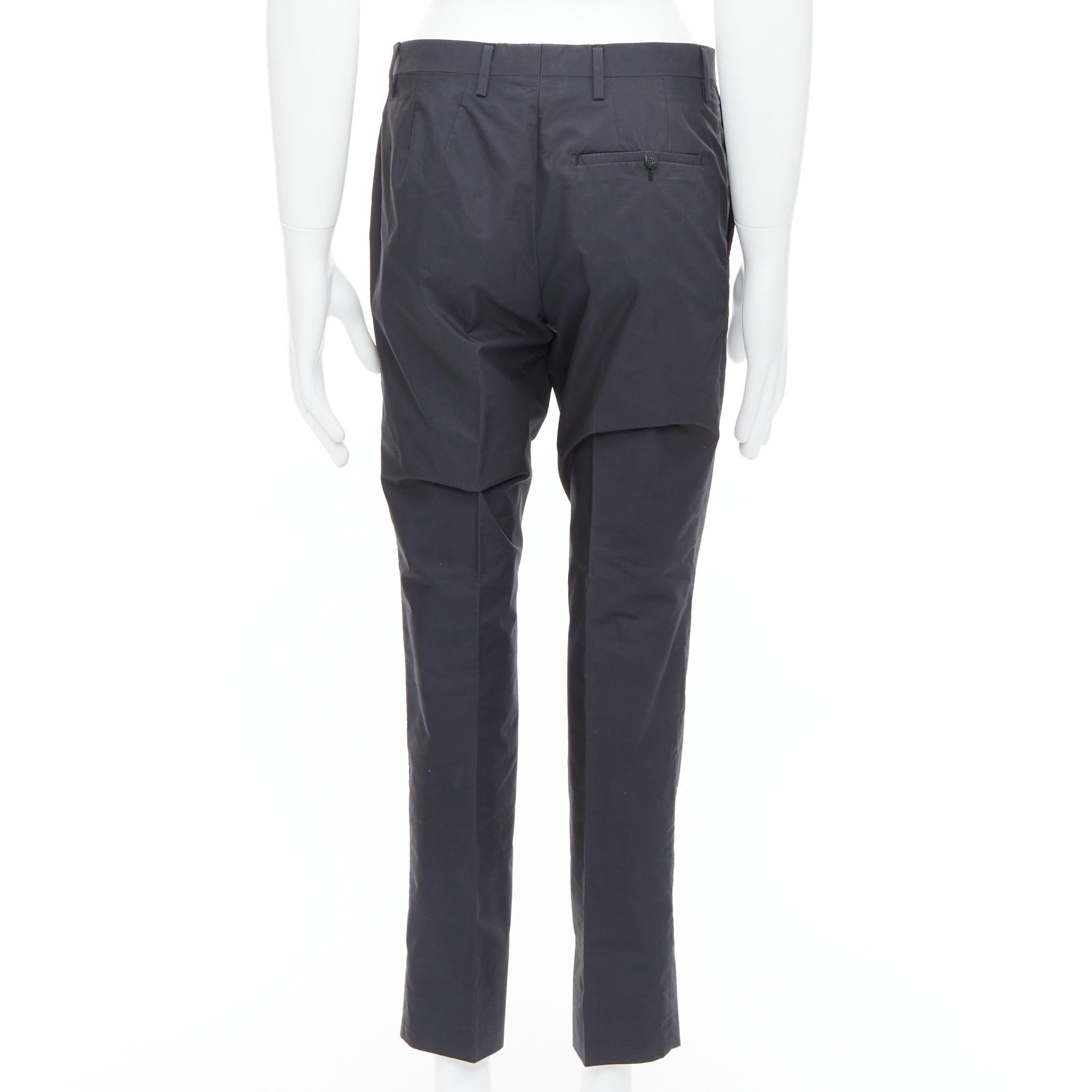 Uomo LANVIN pantaloni affusolati neri in crepe di misto lana con chiusura a scomparsa FR44 XS in vendita