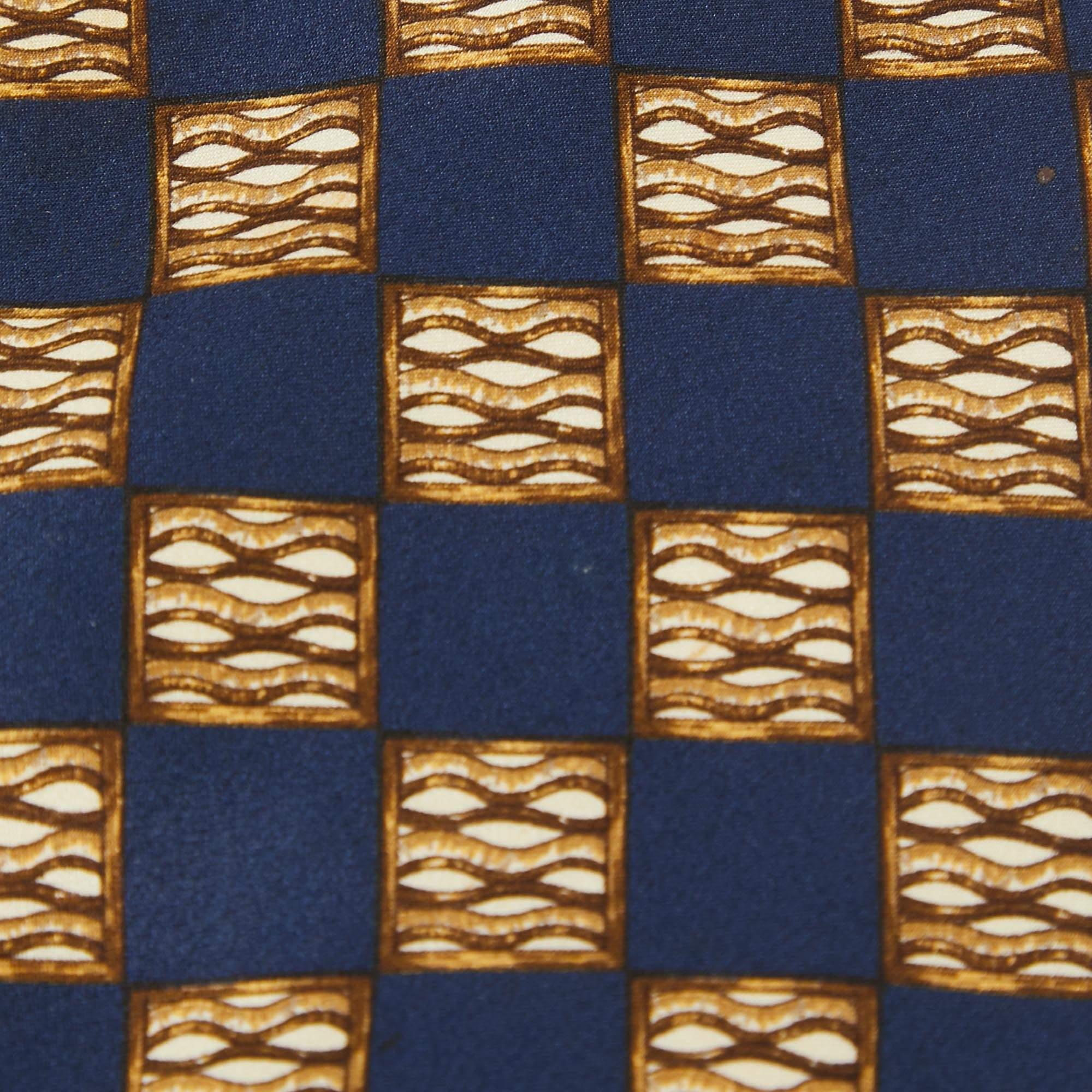 The Lanvin pocket square and traditional tie offer a striking blend of vibrant hues and intricate patterns. Crafted from luxurious satin silk  this set adds a touch of refined style to any ensemble. Perfect for the discerning gentleman  it enhances