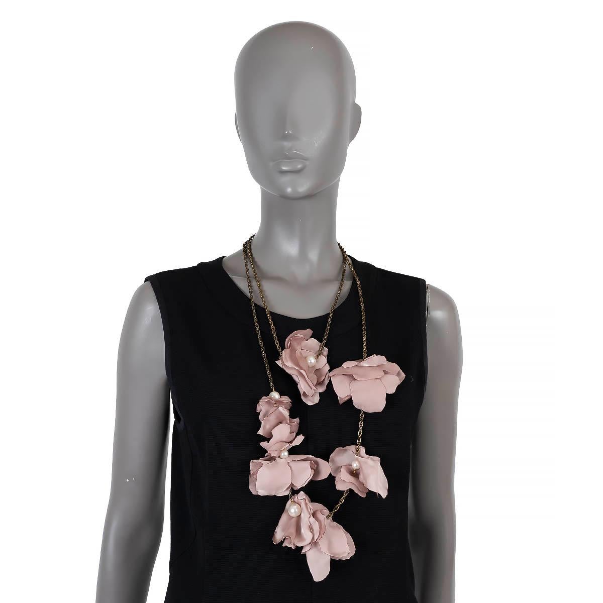 100% authentic Lanvin chain necklace in antique gold-tone with delicate blush pink silk flower petals and faux pearls. Has been worn and is in excellent condition. 

Measurements
Length	162cm (63.2in)
Hardware	Antique Gold-Tone

All our listings