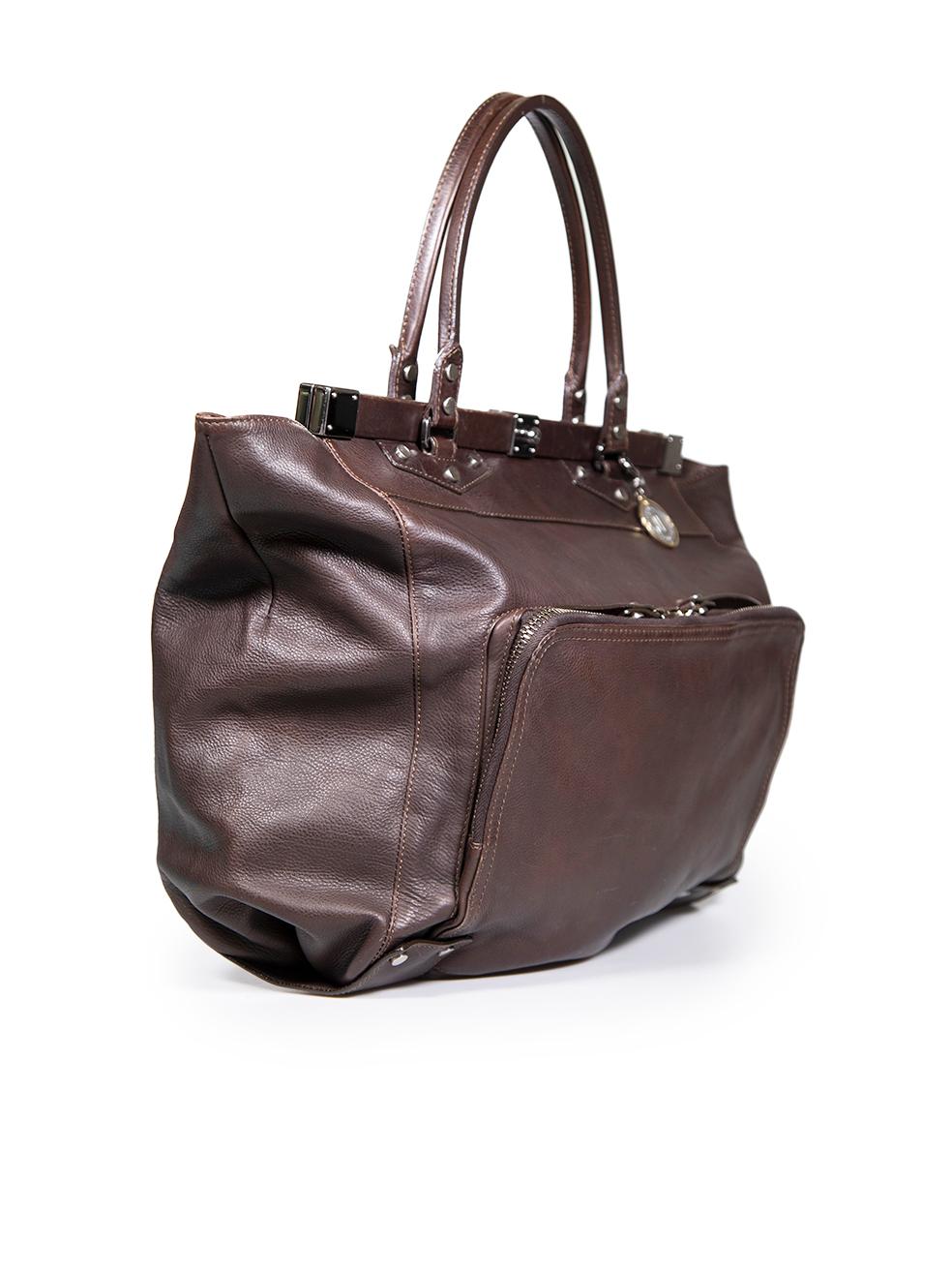 CONDITION is Good. Minor wear to bag is evident. Light wear to the front, back, handles, base and lining with scratches and abrasions to the leather. The rear right handle base has also split on this used Lanvin designer resale item.
 
 Details
