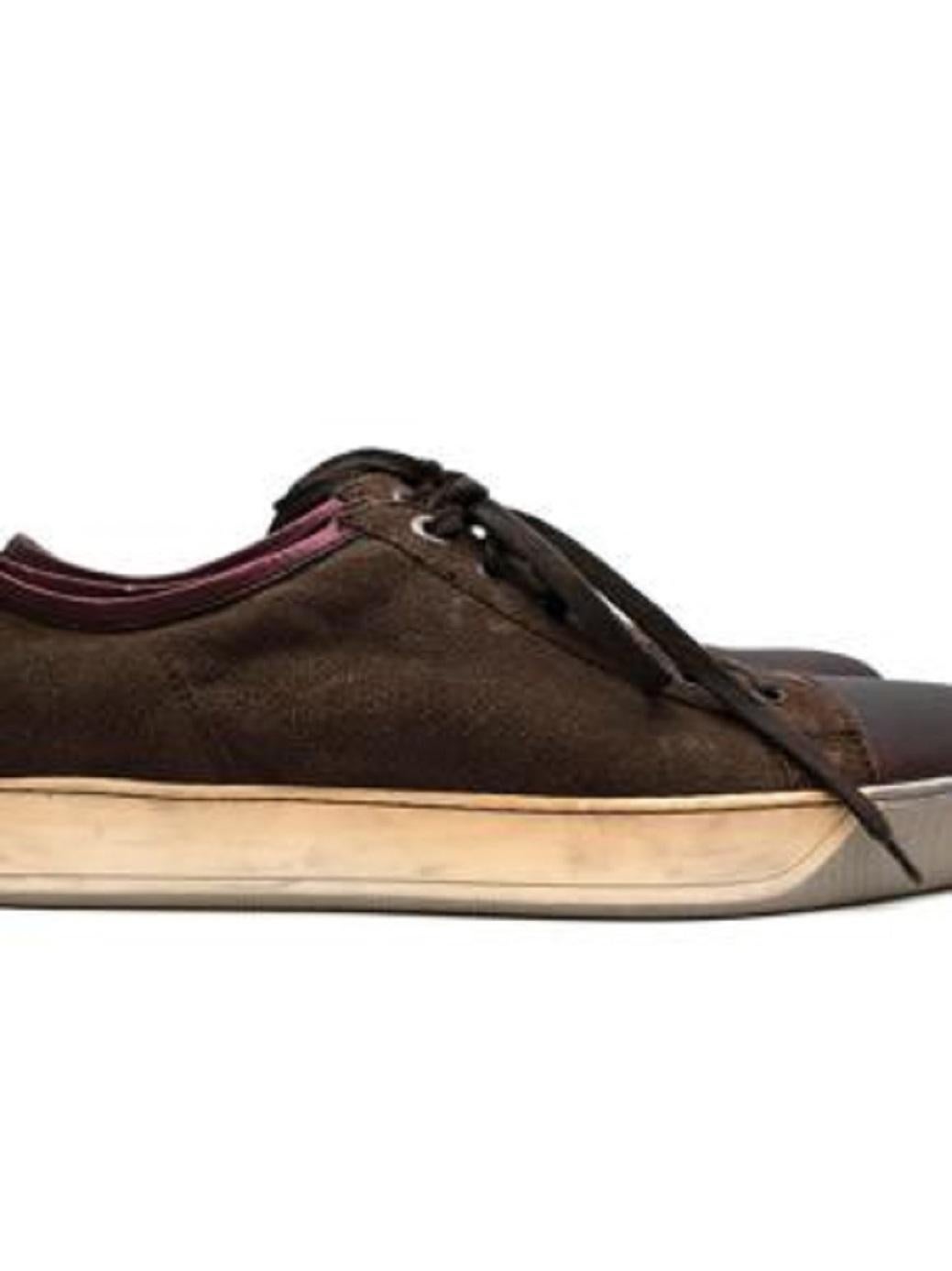 Lanvin Brown Suede Sneakers 

-Soft suede texture 
-Luxurious soft leather lining
-Gorgeous metallic burgundy details
-Aged effect rubber soles for adherence 
-Lace-up fastening to the front 
 
Materials:

Main suede 
Lining- leather 
Soles- rubber 