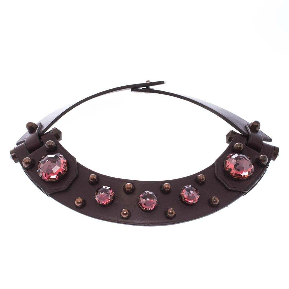 Chokers have made a dramatic comeback in the fashion world. Embrace the style with this stunning necklace from the house of Lanvin. It features a trendy burgundy leather body secured with snap button closure and detailed with crystal embellishments