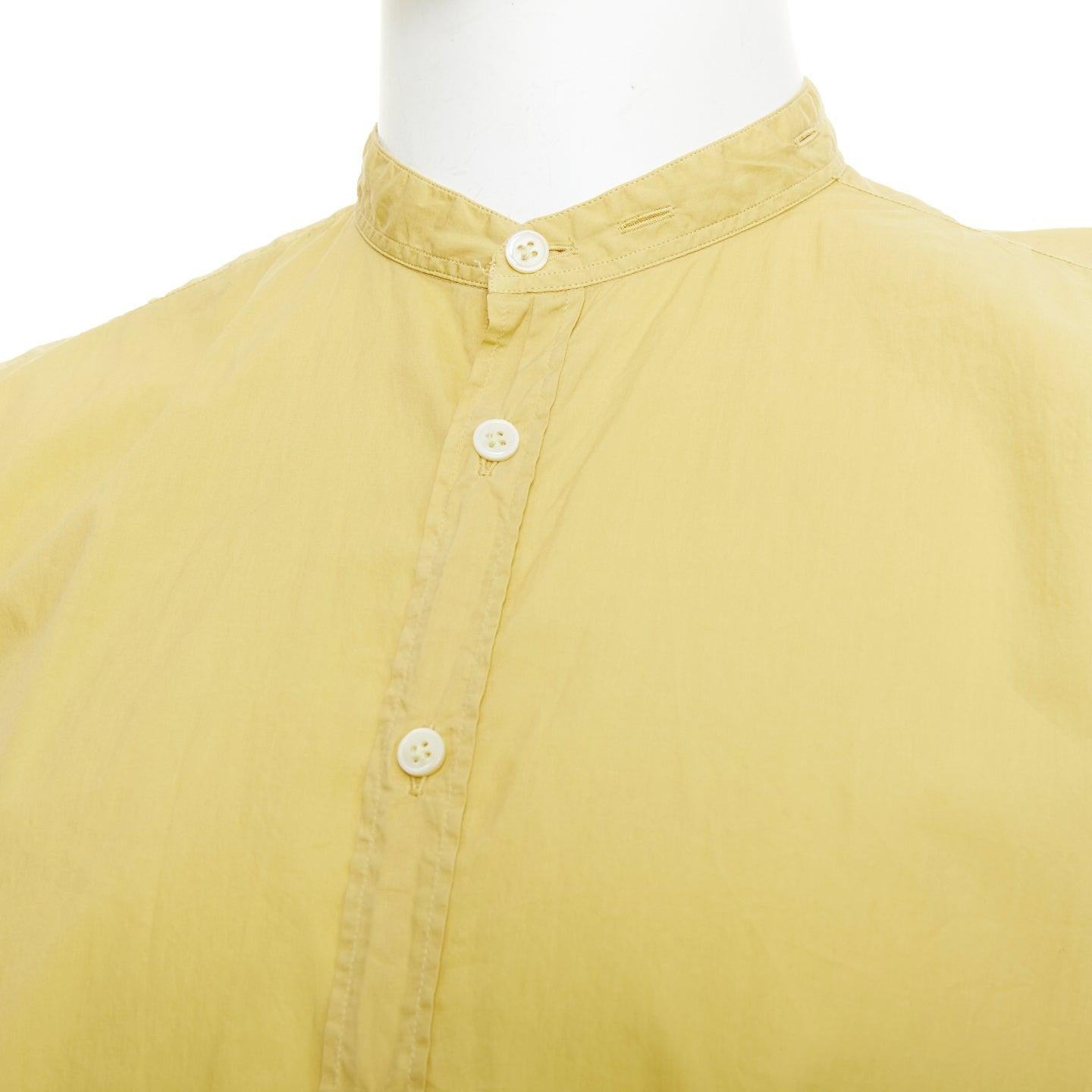 LANVIN giallo burro, camicia in cotone con collo a vescovo e bottoni, EU40 L.
Riferimento: PRWU/A00193
Marchio: Lanvin
Designer: Alber Elbaz
Materiale: Sembra cotone
Colore: giallo
Modello: Tinta unita
Chiusura: bottone
Dettagli extra: Collo a