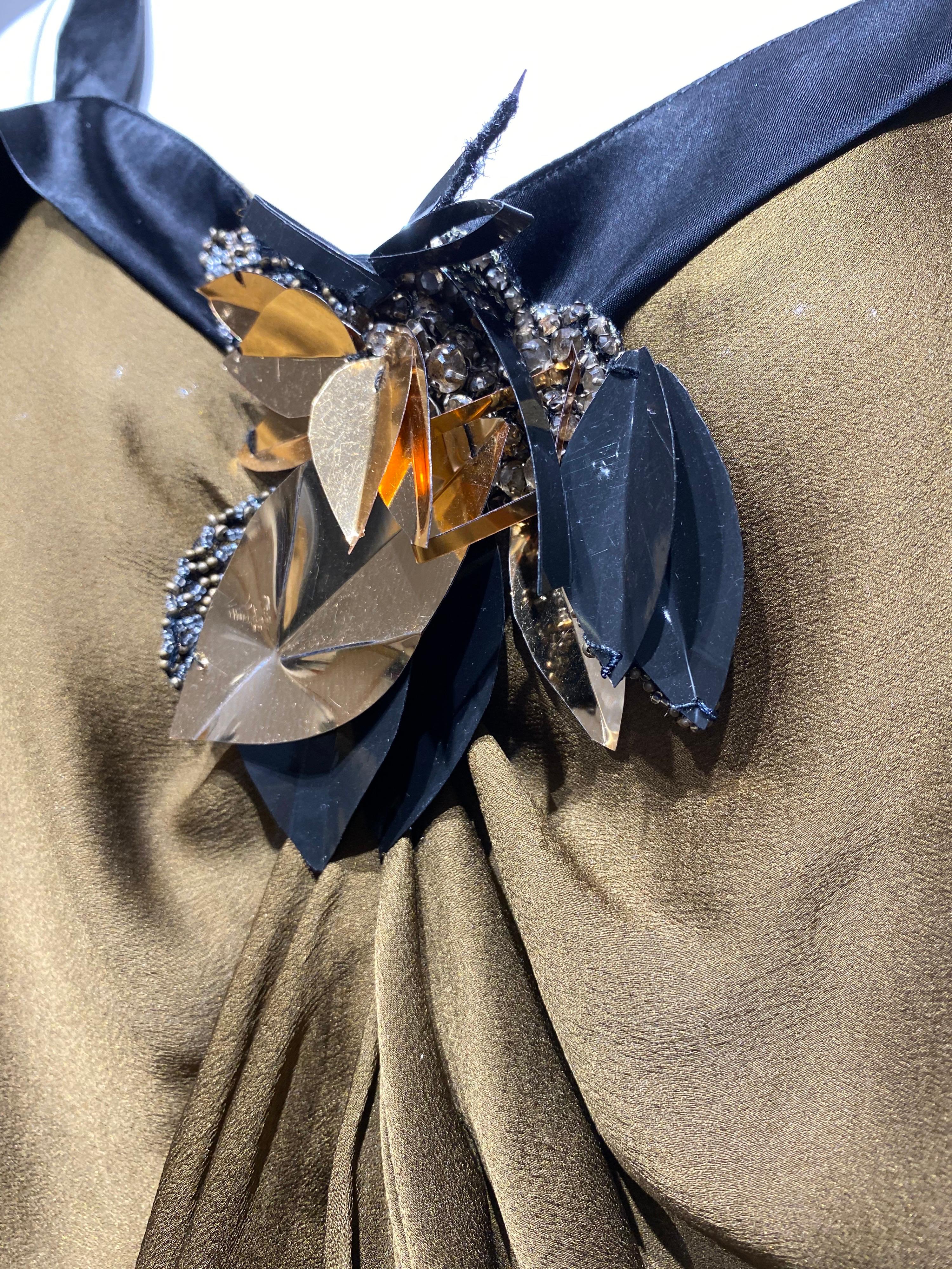 Lanvin by Alber Elbaz Braunes Seidencocktailkleid mit schwarzem Spaghettiträger.
Kleid Tropfen Taille Verschluss, der einstellbar ist.\
Passform Größe Small- Medium ( 2/4/6)