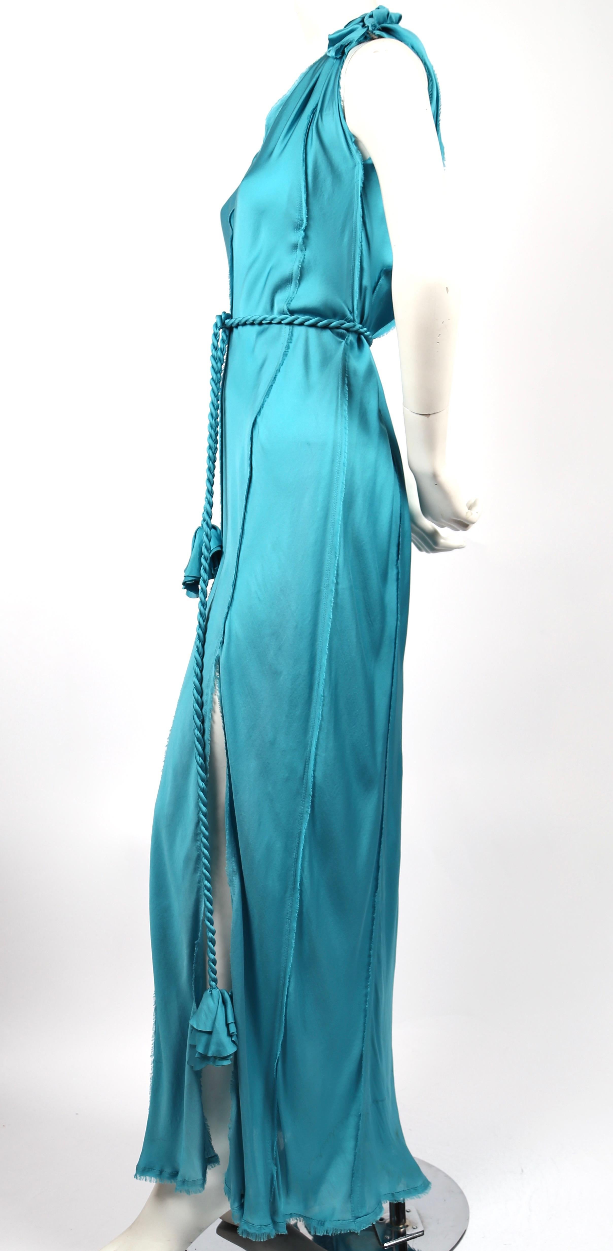 Turquoise silk, bias cut, dress with raw edges and twisted rope belt with rosettes designed by Alber Elbaz For Lanvin dating to spring of 2012. French size 36.  Measurements are very difficult to take due to the bias cut however approximate length
