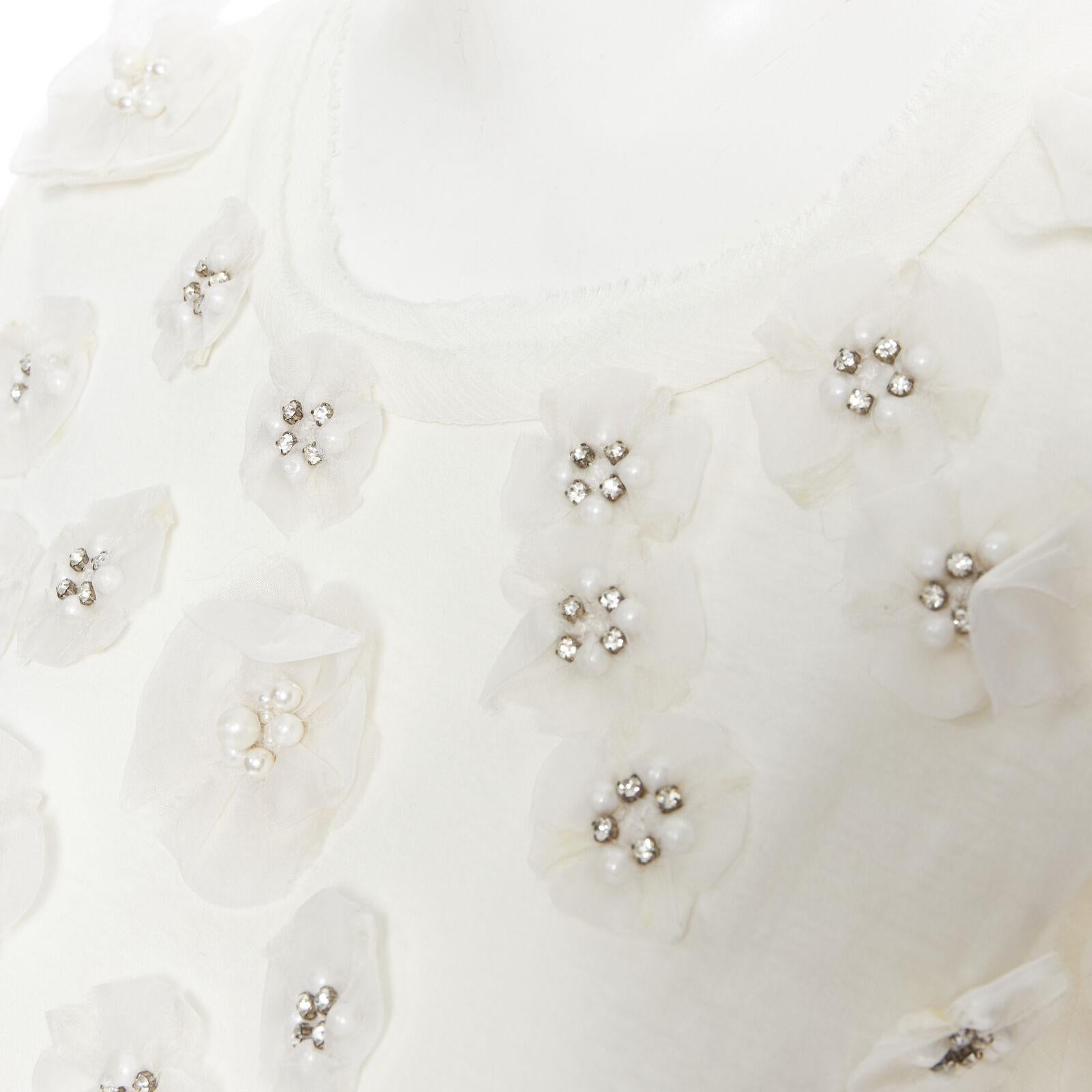 LANVIN Kollektion Blanche T-Shirt aus weißer Seide mit Perlen und Kristallverzierung XS
Referenz: SNKO/A00104
Marke: Lanvin
Designer: Alber Elbaz
Modell: Blumen-T-Shirt
Collection'S: Collection'S Blanche
MATERIAL: Baumwolle
Farbe: Weiß
Muster: