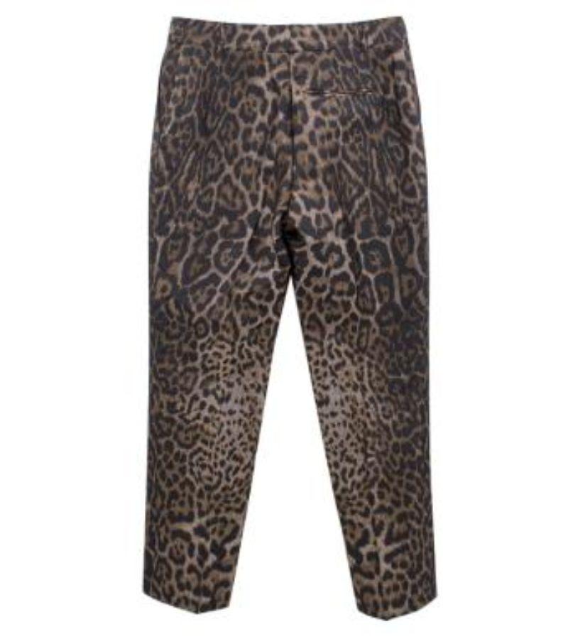 Lanvin cropped leopard print trousers. Featuring front zip fastening and belt loops.

Please note, these items are pre-owned and may show signs of being stored even when unworn and unused. This is reflected within the significantly reduced price.