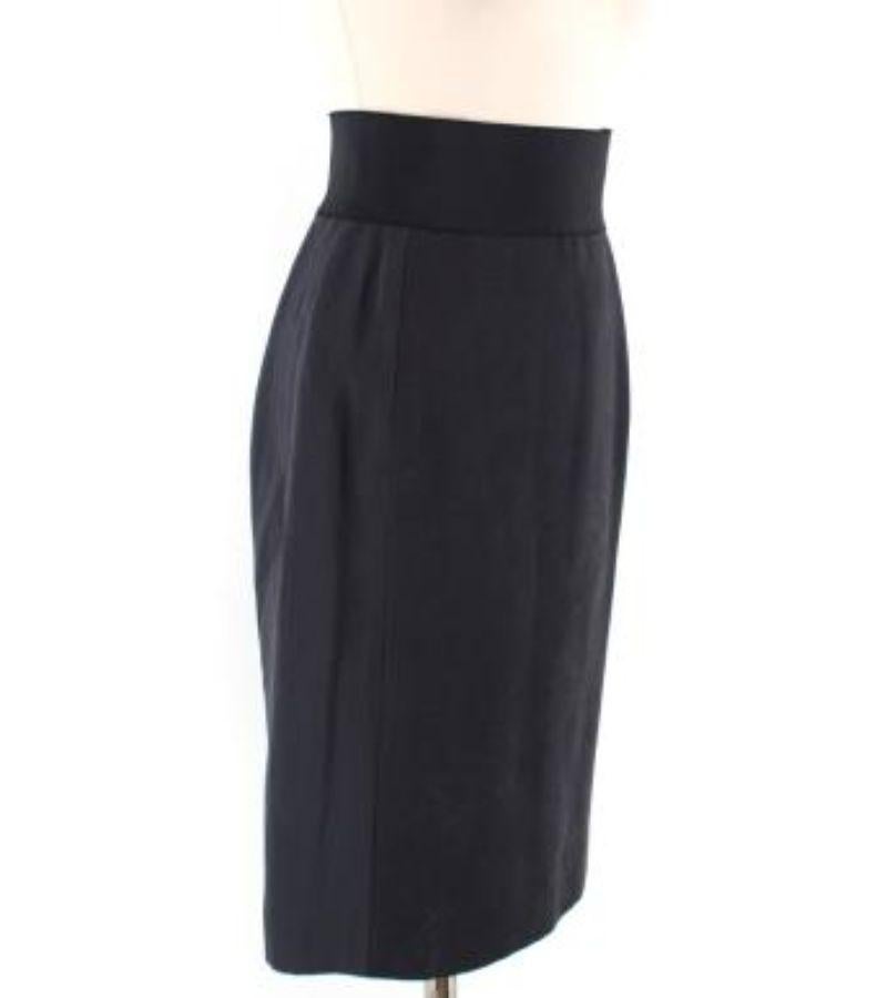 Lanvin Dark Grey Midi Skirt

-Grey wool skirt back zip closure
-Ribbed elasticated waistband
-Front back panel

Please note, these items are pre-owned and may show signs of being stored even when unworn and unused. This is reflected within the
