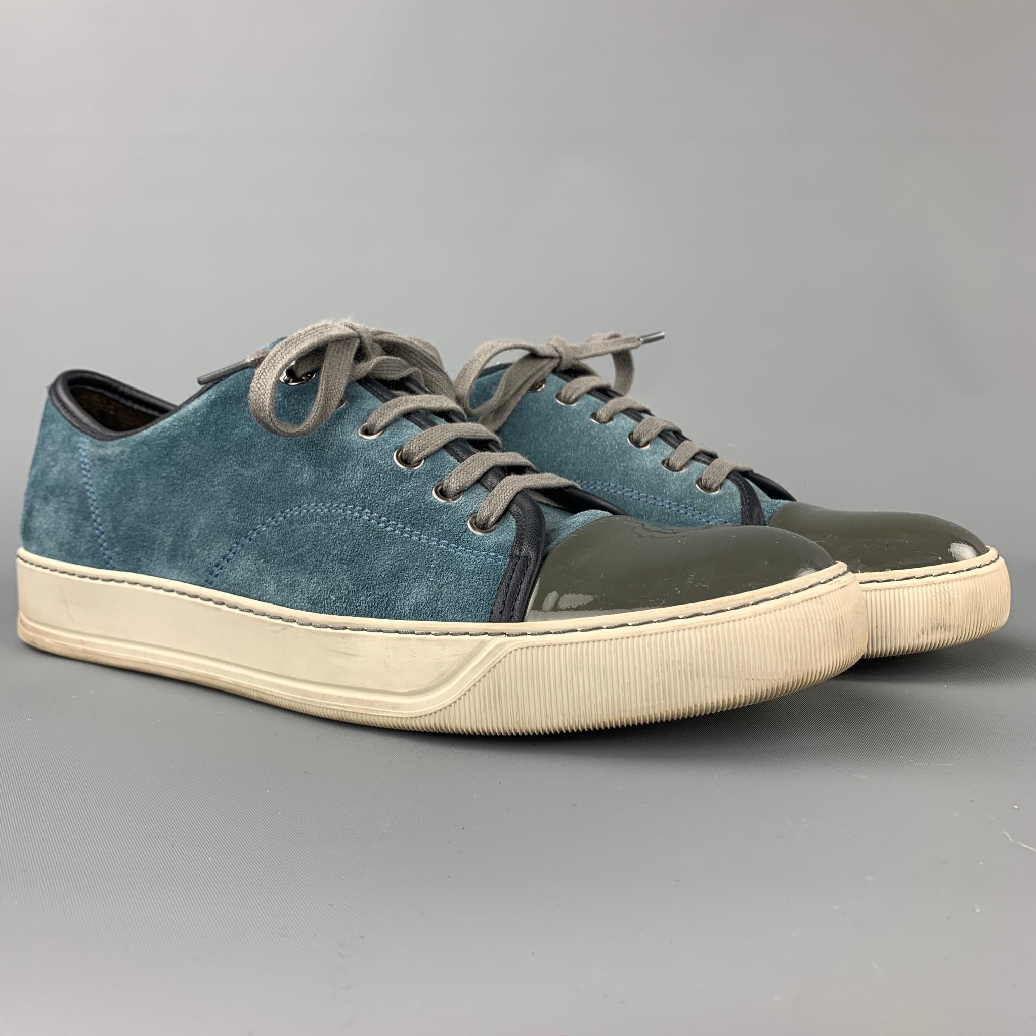 LANVIN sneakers comes in a blue suede with a gray trim featuring a rubber sole and a lace up closure. Moderate wear. Made in Portugal.

Good Pre-Owned Condition.
Marked: 8

Outsole:

11.5 in. x 4 in. 