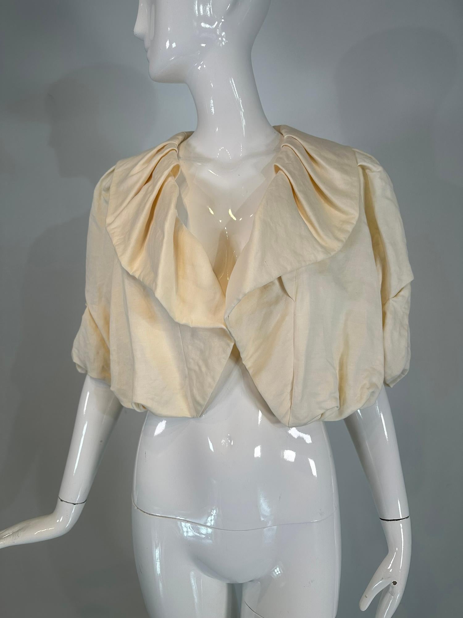 Lanvin Ete' Albert Elbaz 2006 cream linen/cotton blend shawl collar, cropped, puff sleeve jacket, unworn with tags. Deep pleated shawl collar, short puff sleeves with an open front & puffy hem. Lined in cream cotton. Unworn with the original tags,