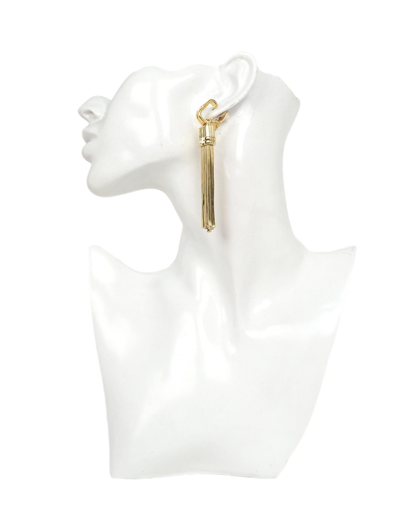 Lanvin Goldtone Chain Tassel Clip On Earrings W/ Crystals

Color: Goldtone, white
Materials: Goldtone metal
Hallmarks: On back of clip ons 