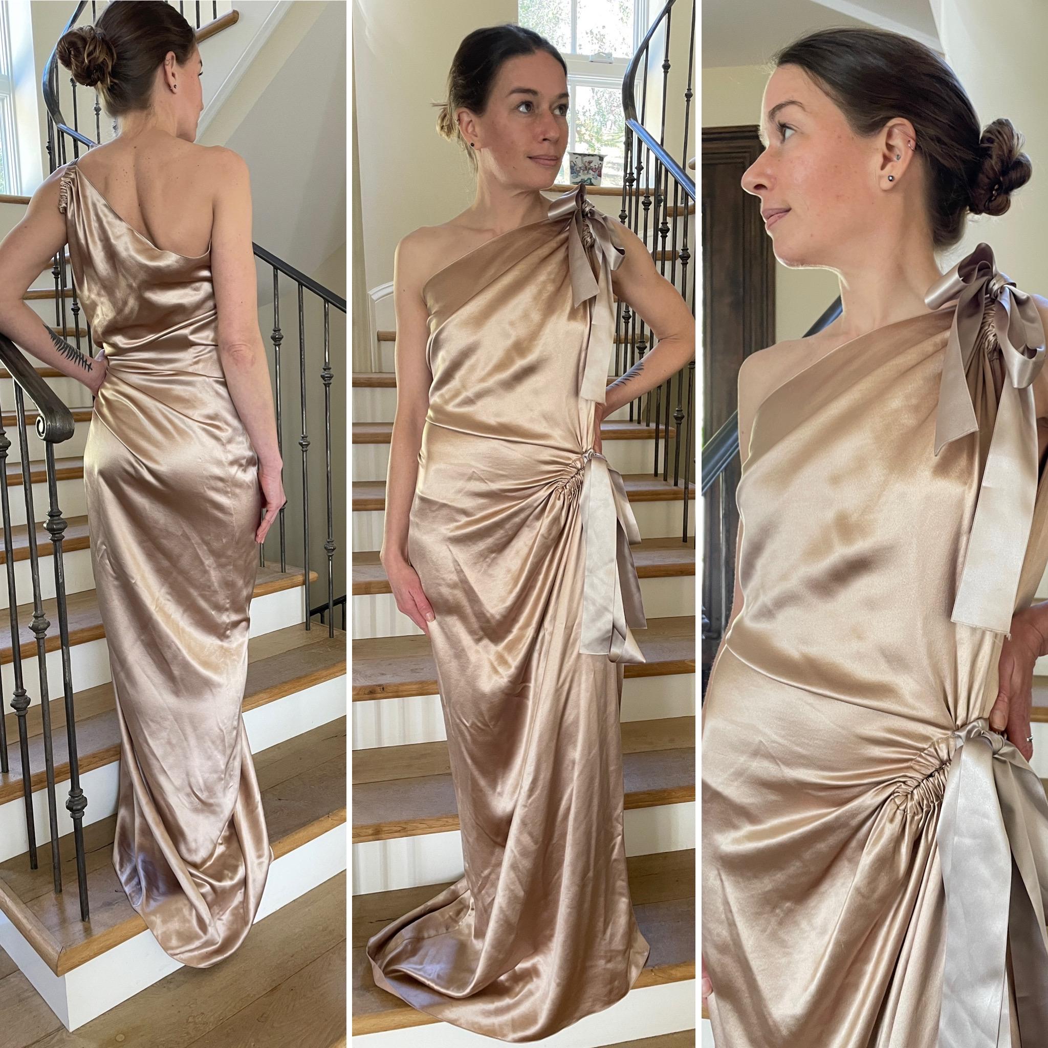 Lanvin by Alber Elbaz Gorgeous Golden One Shoulder Silk Charmeuse Goddess Gown
Size 36, but it runs very large, there is a lot of stretch in this fabric.
It is a dull gold, not shiny
 Bust 38