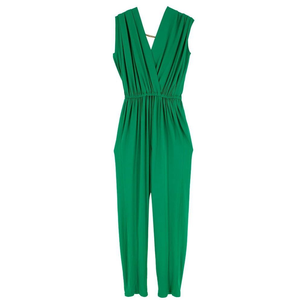 Lanvin Green Draped Chain detail Jumpsuit

Green, stretch fabric jumpsuit
Elasticised ruched waistband 
Deep neckline
Gold-tone chain threading across bust 
Short sleeves
V-neck back design
96% Viscose, 4% Elastane 

Please note, these items are